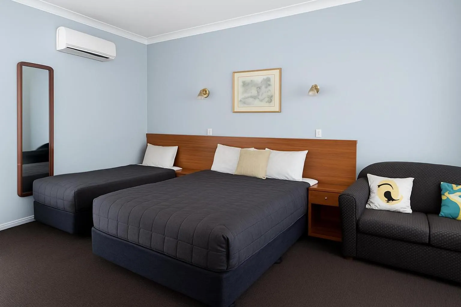 Bed in Colonial Motor Lodge Scone