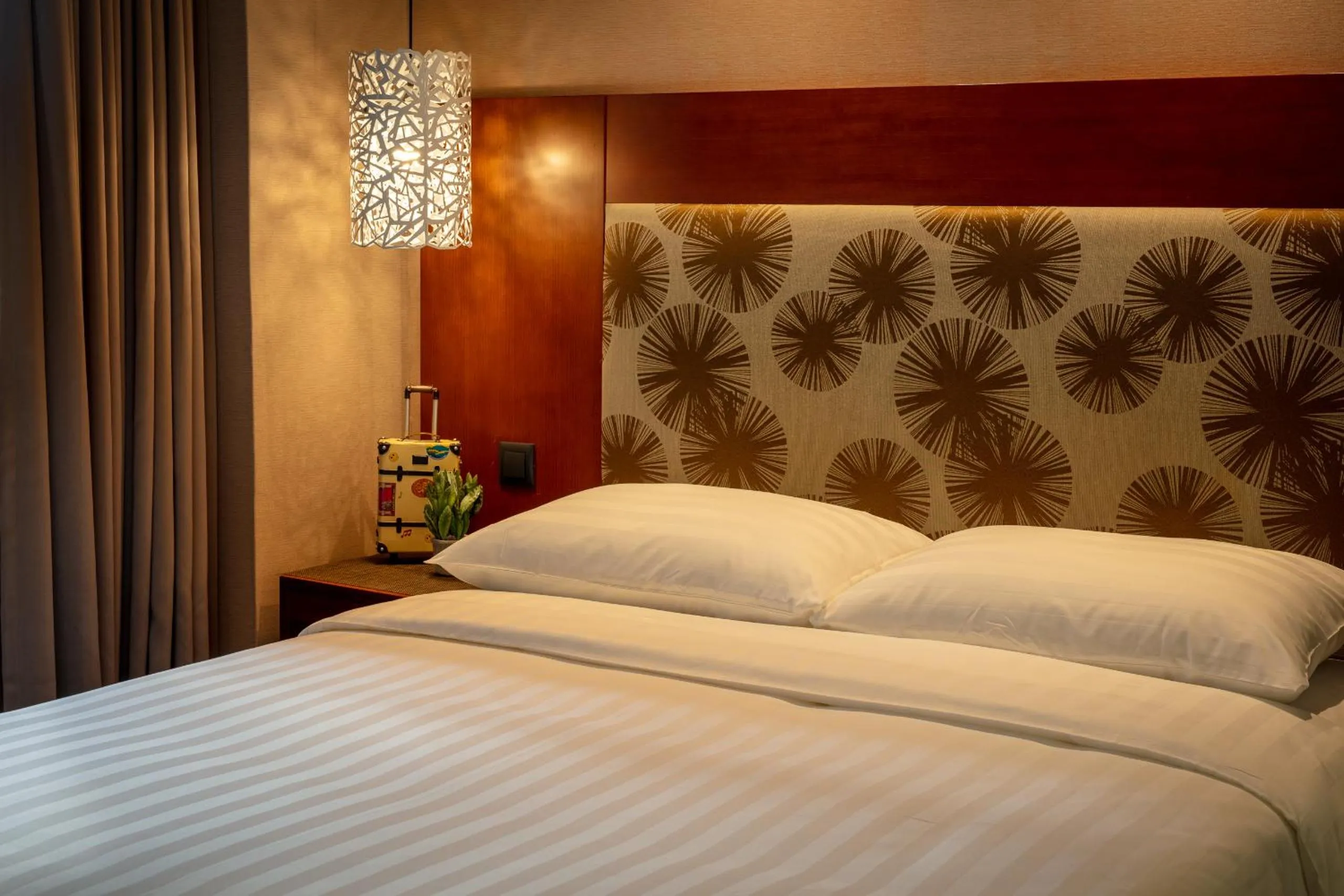 Bed in Rich & Free Hotel - Kaifeng 富逸旅趣-北車開封館