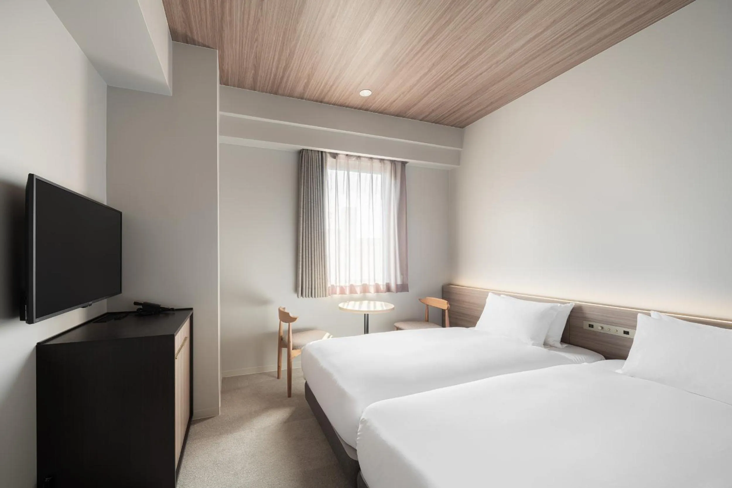 Photo of the whole room, Bed in Nest Hotel Hiroshima Ekimae