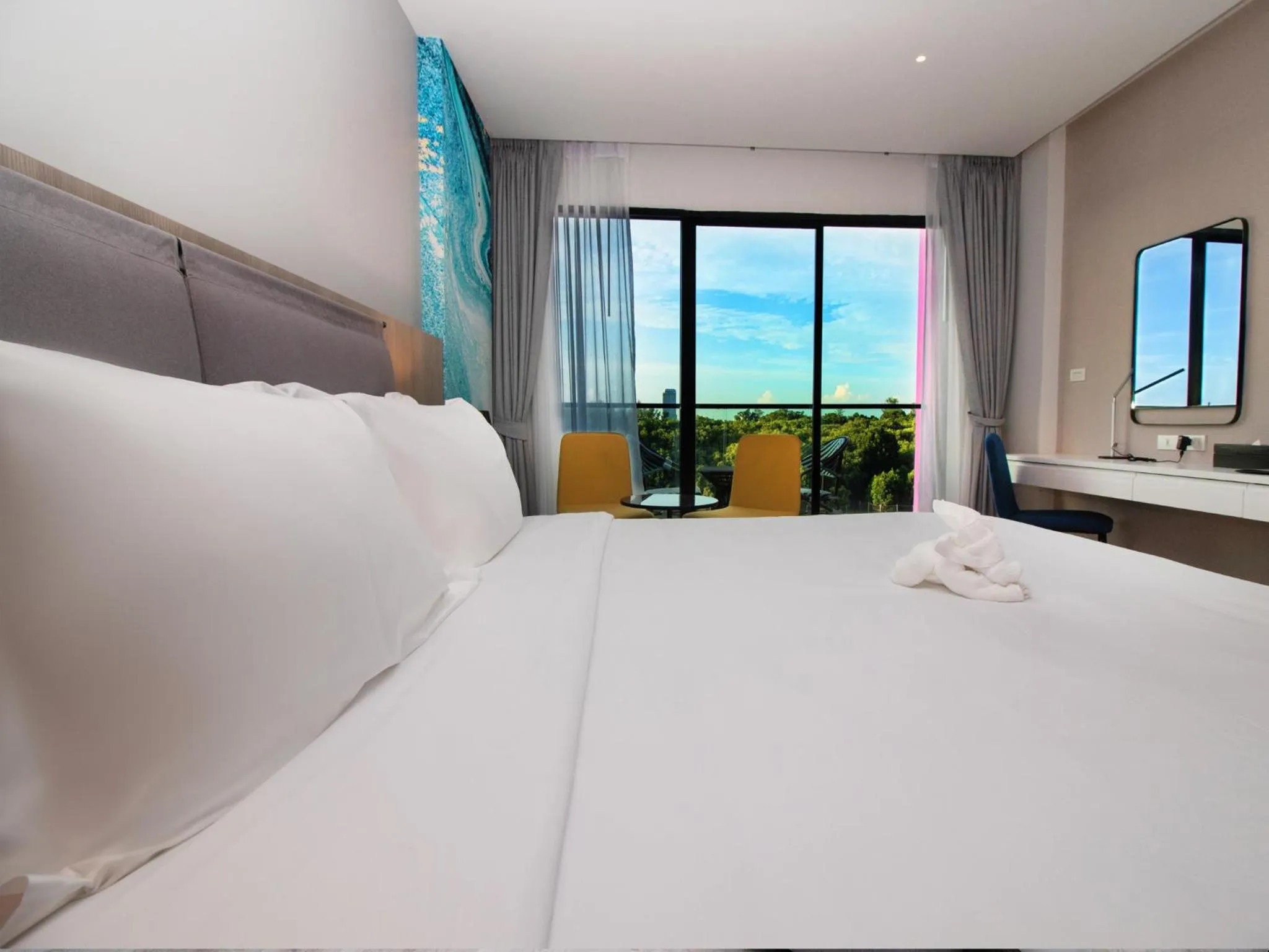 Bed in Fortune Saeng Chan Beach Hotel Rayong - SHA Plus