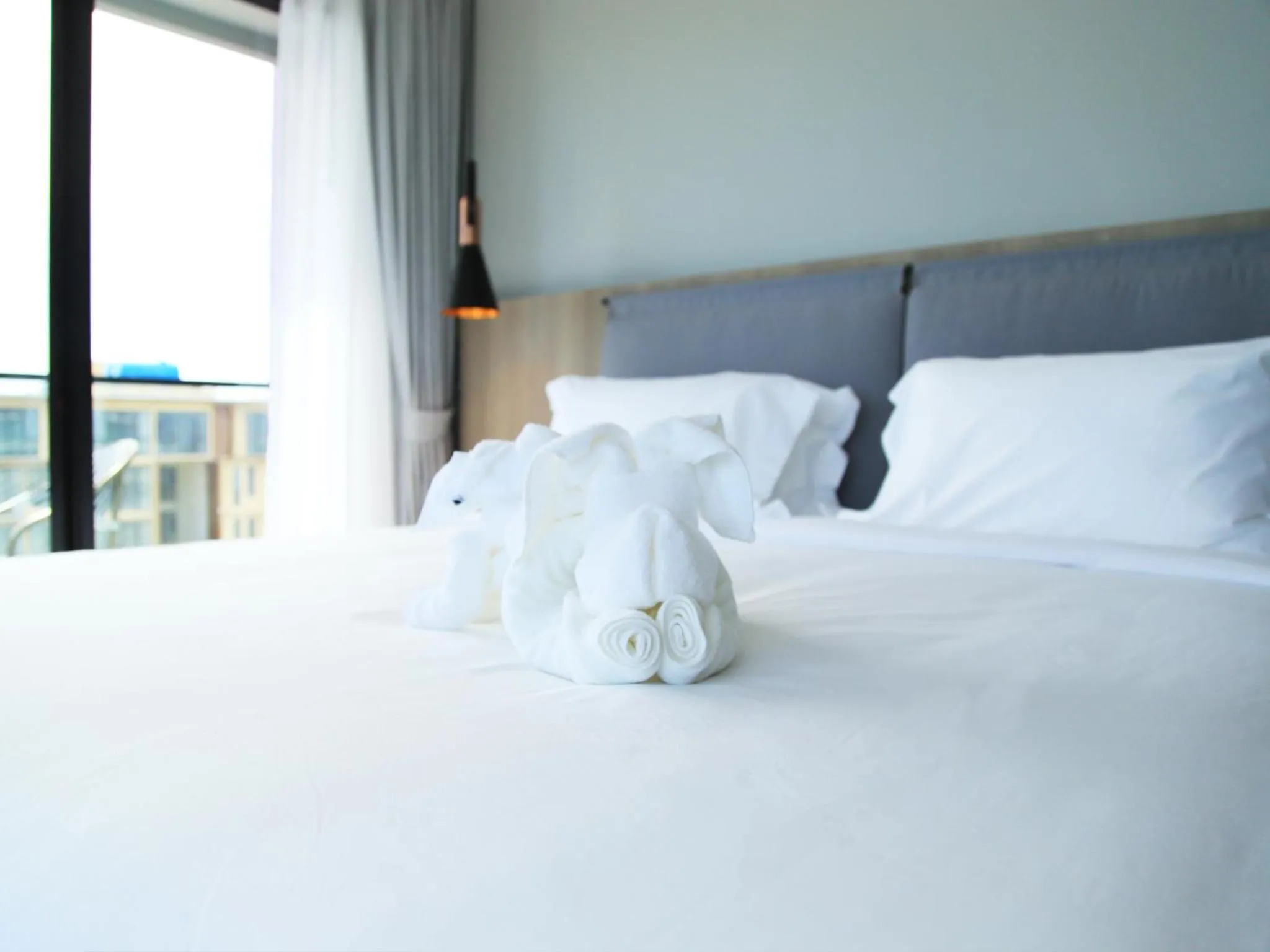 Bed in Fortune Saeng Chan Beach Hotel Rayong - SHA Plus