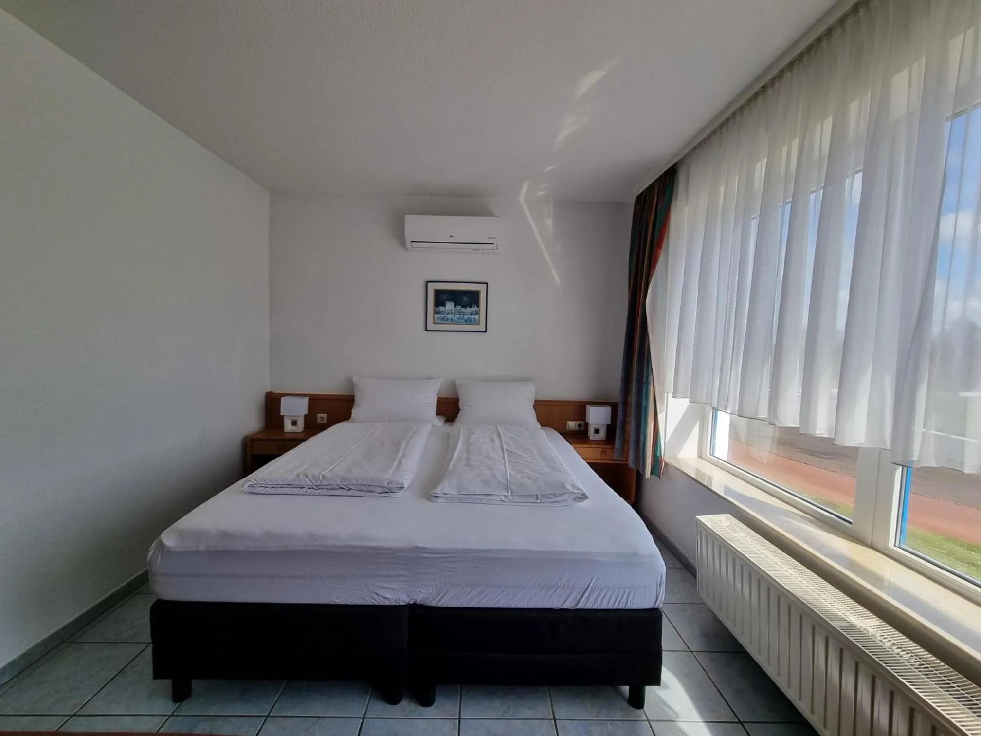 Bed in Erbenholz Hotel