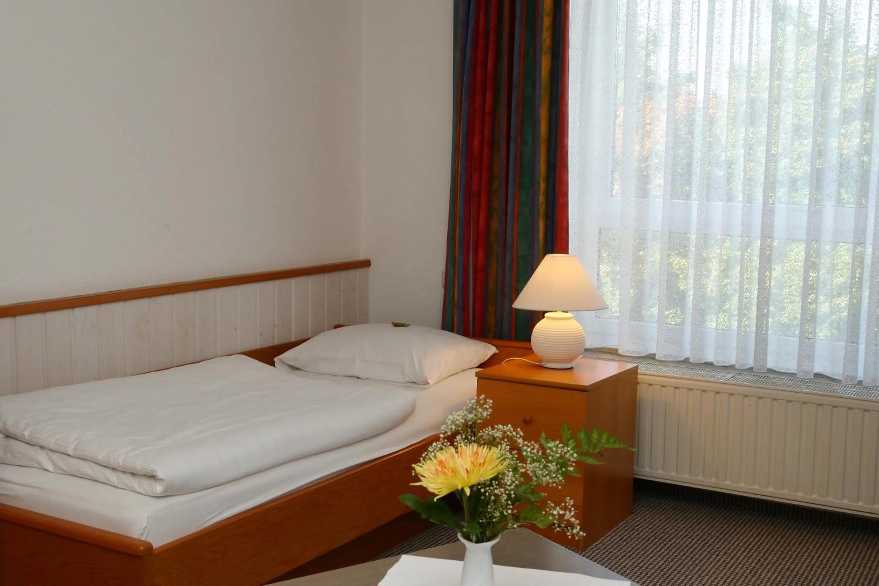 Bed in Erbenholz Hotel
