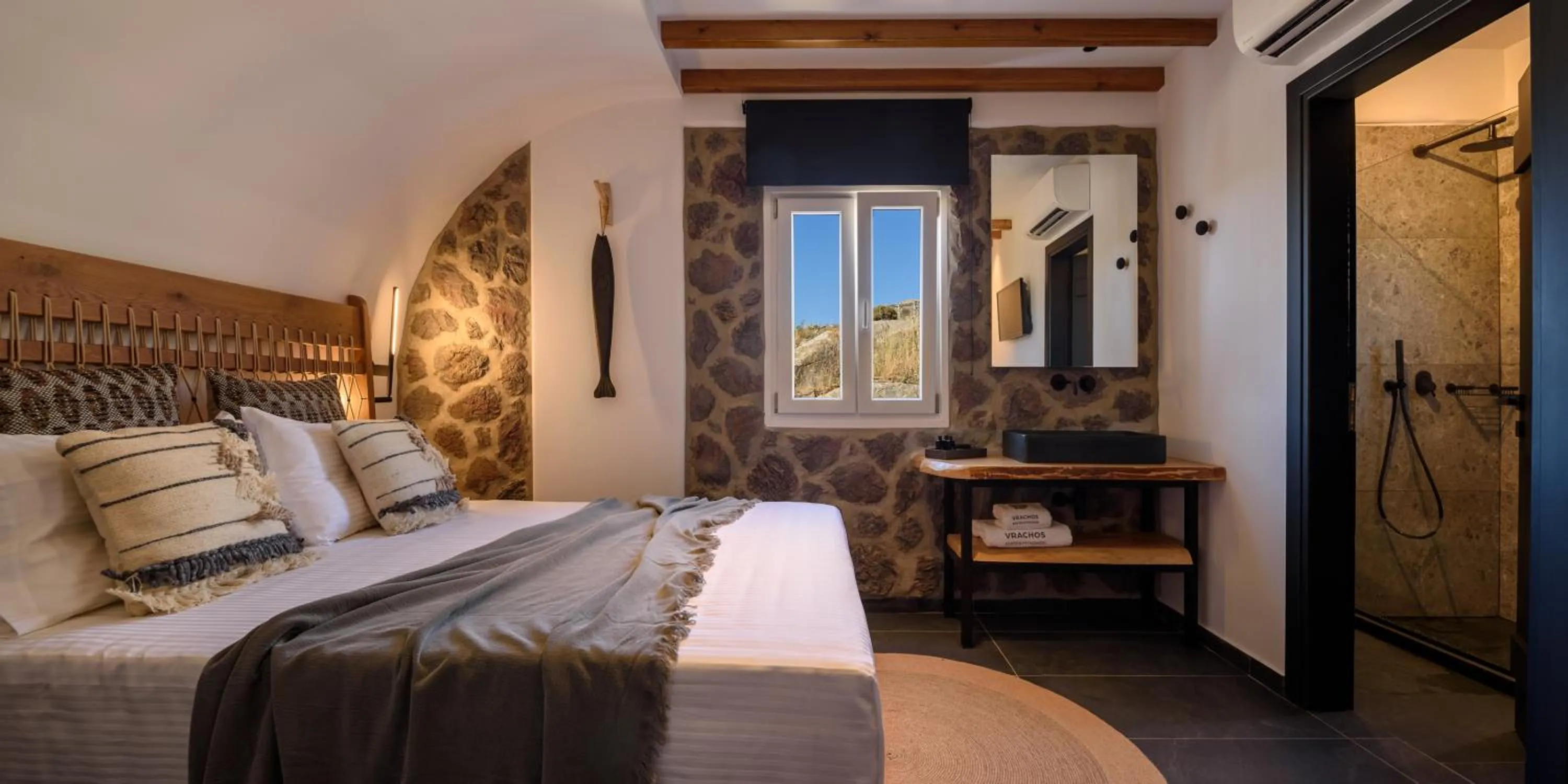 Bed in Vrachos Suites Mykonos