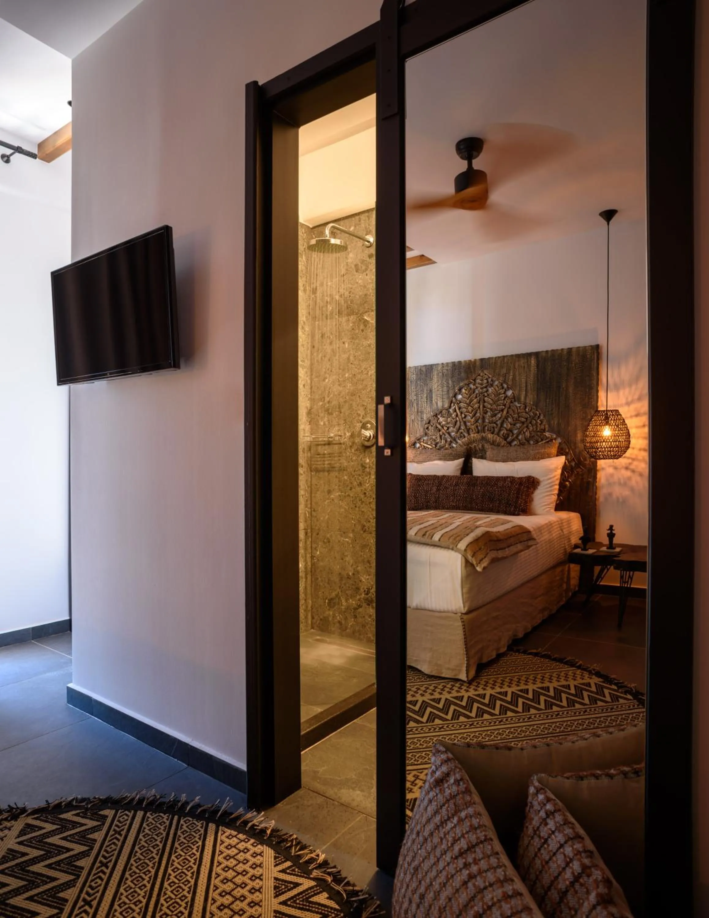 Bed in Vrachos Suites Mykonos