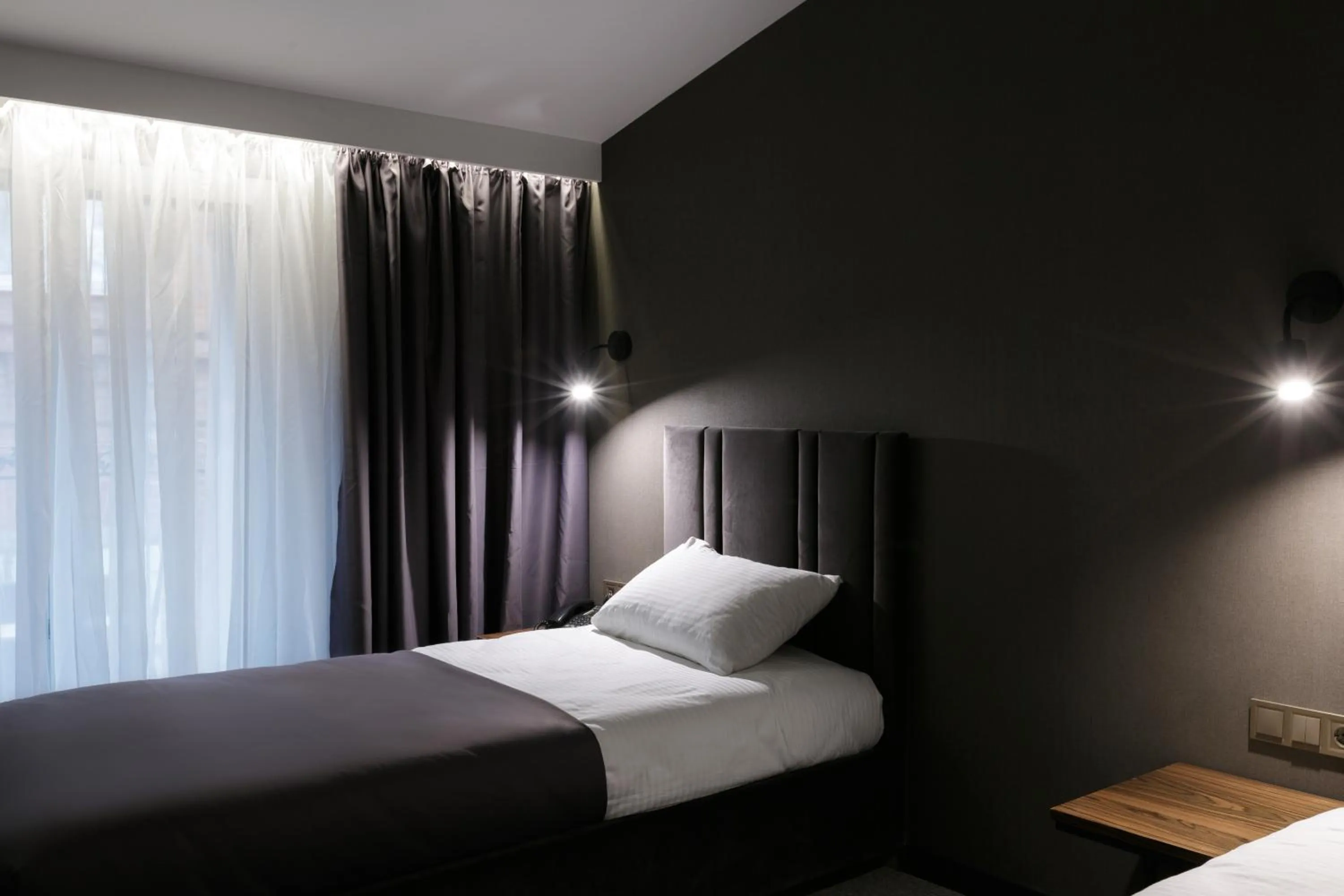 Bed in Kulikovskiy hotel