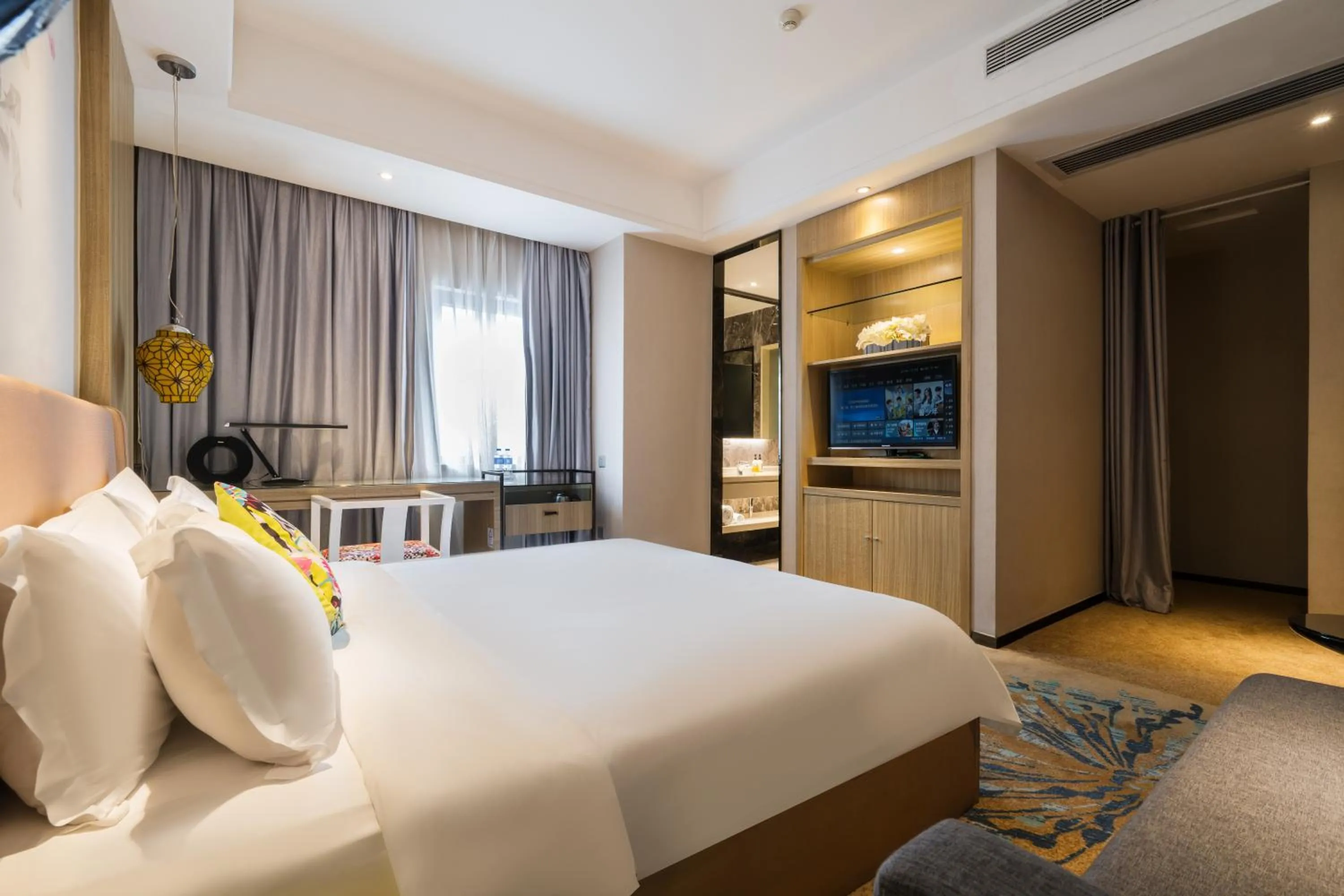 Photo of the whole room, Bed in Paco Hotel Tаojin Metro Guangzhou