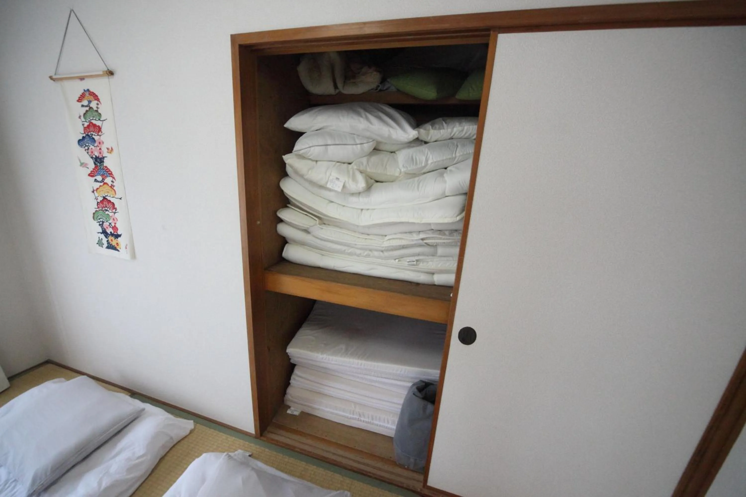 Bed in Exsaison house Kumoji