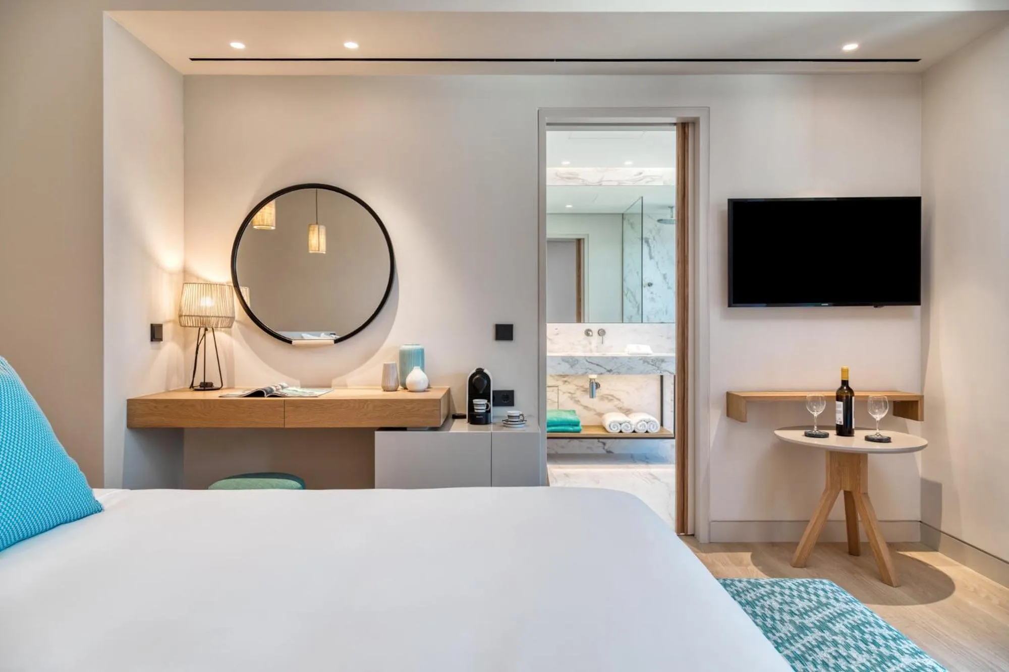 Bathroom, Bed in Vathi Cove Luxury Resort & Spa - Adults Friendly 14 plus