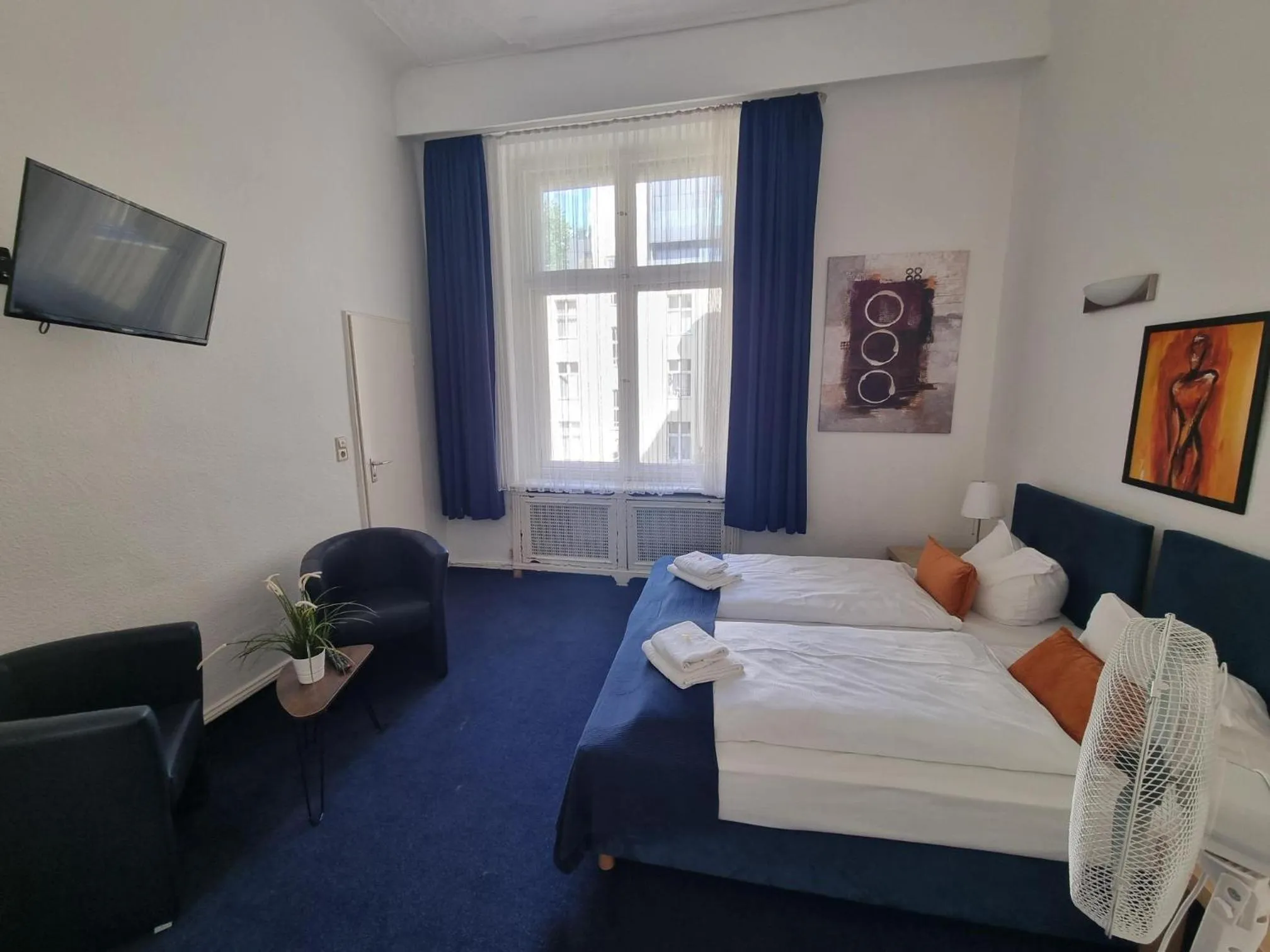 Bed in Hotel Seifert Berlin am Kurfürstendamm