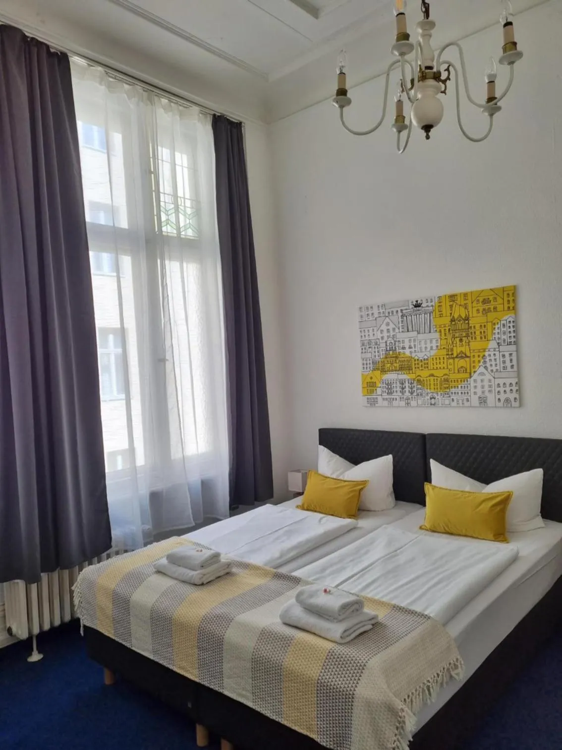 Bed in Hotel Seifert Berlin am Kurfürstendamm