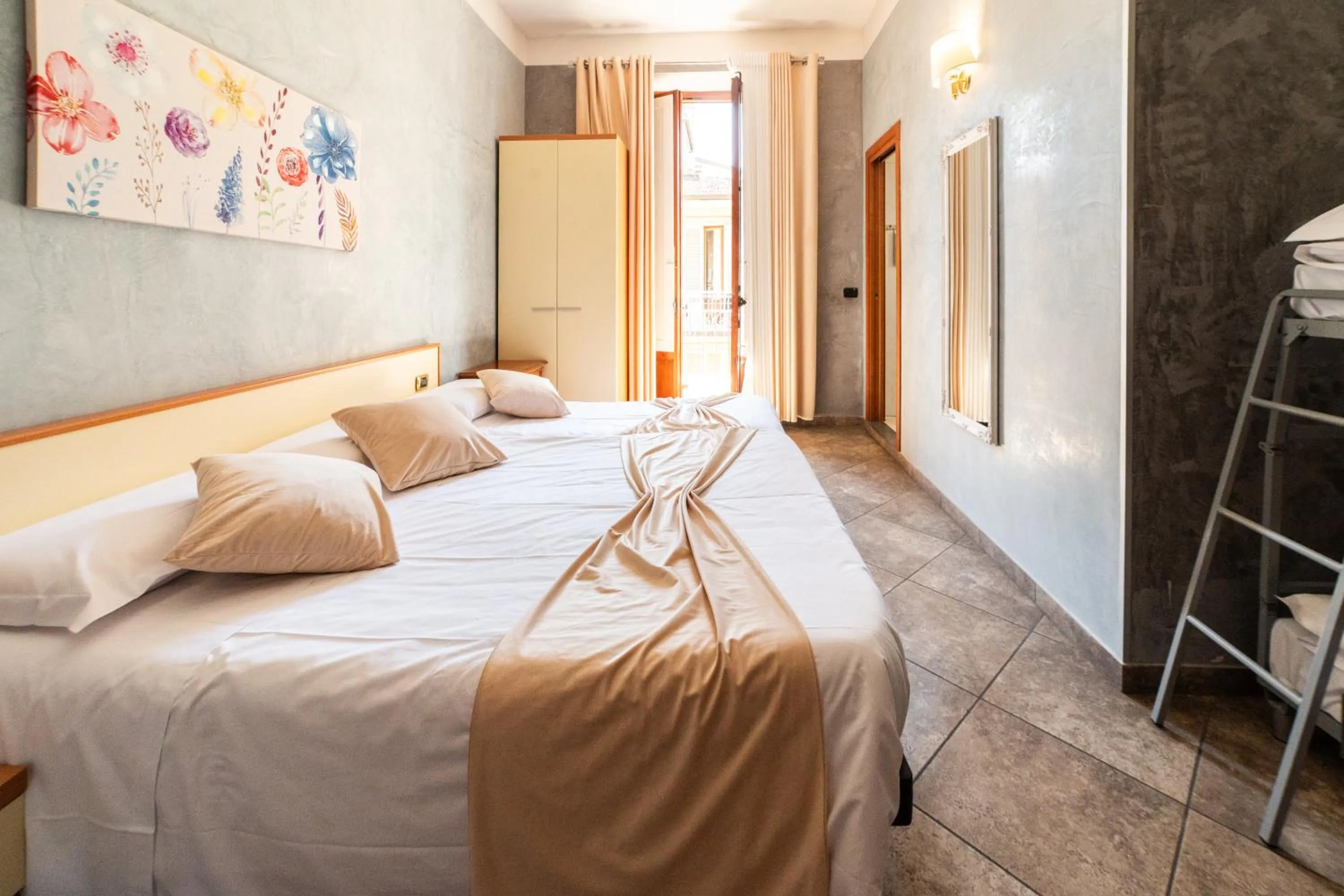 Bed in Hotel Angelica Firenze