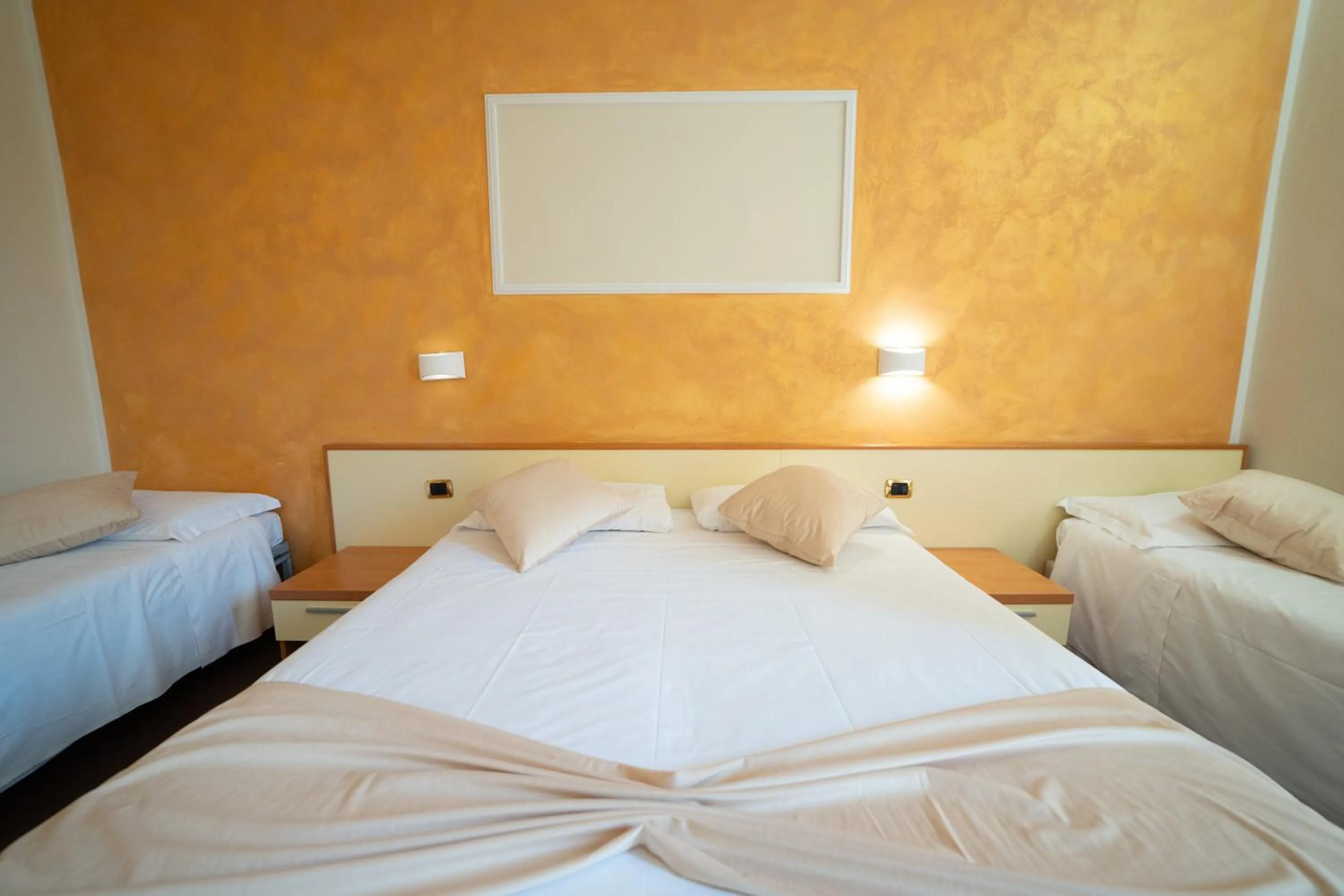 Bed in Hotel Angelica Firenze