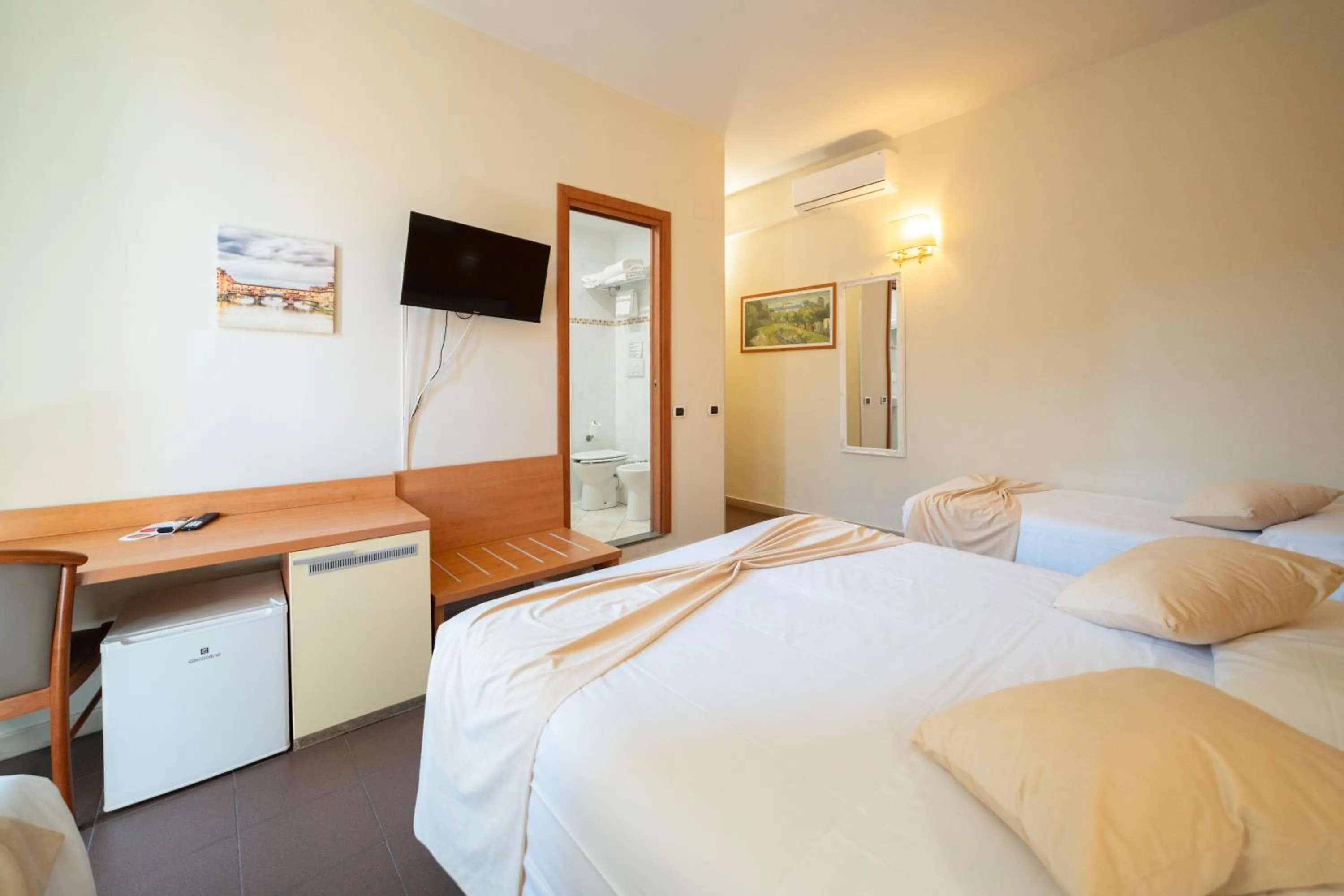 Bed in Hotel Angelica Firenze