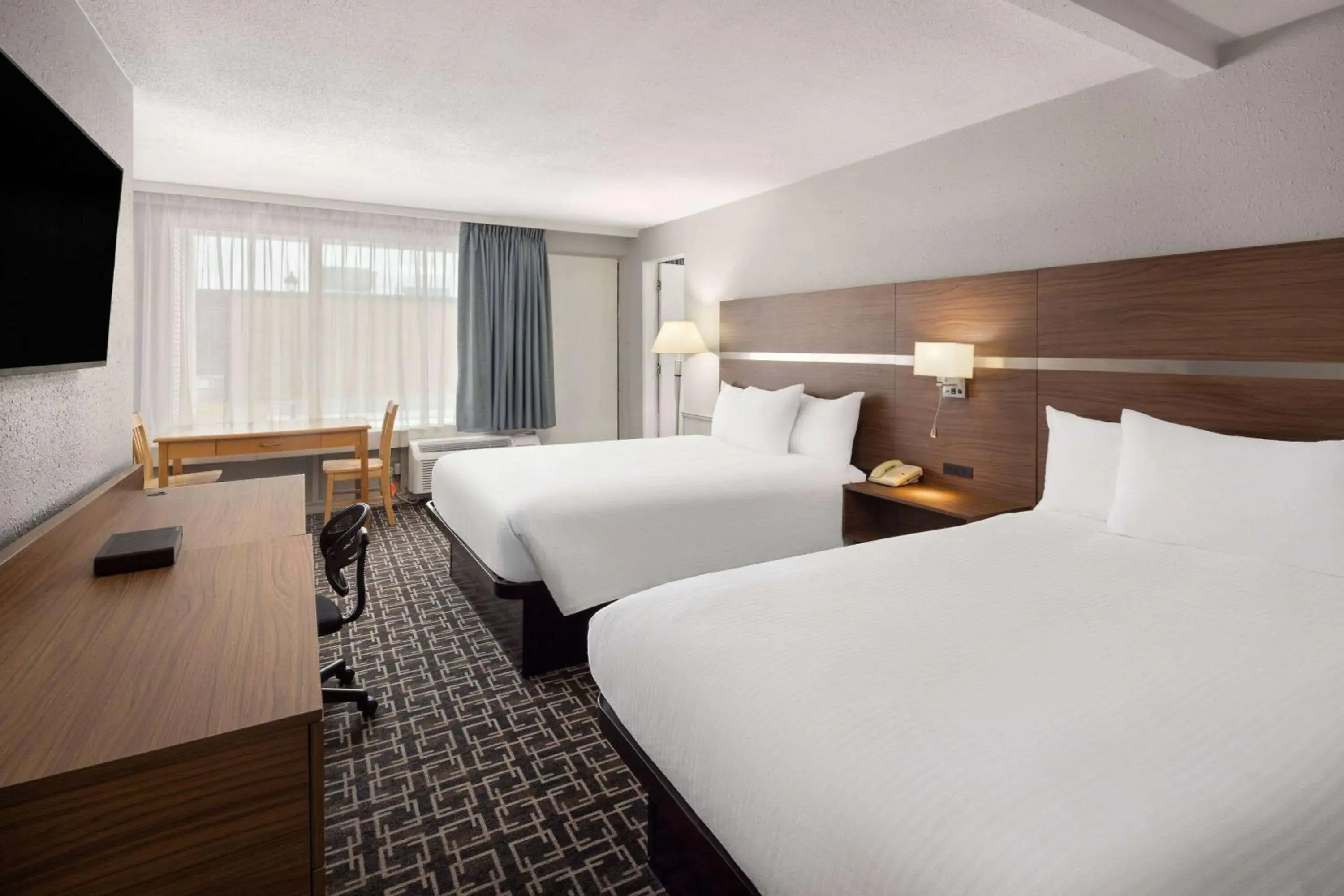 Suite with Three Queen Beds, Kitchenette, Non-Smoking in Baymont by Wyndham Edson Suite with Three Queen Beds, Kitchenette, Non-Smoking in Baymont by Wyndham Edson