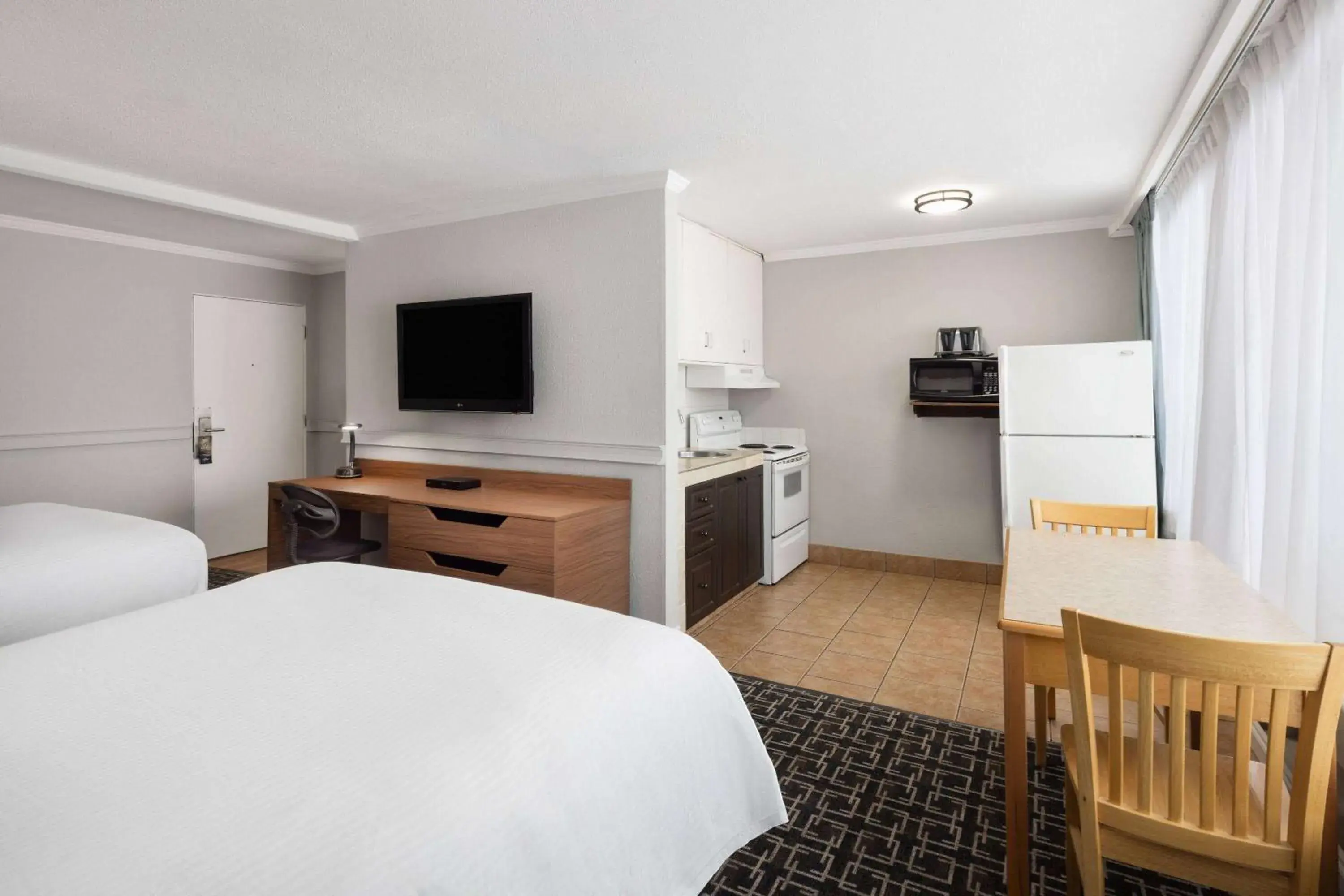 Deluxe Queen Room with Two Queen Beds - Non-Smoking in Baymont by Wyndham Edson Deluxe Queen Room with Two Queen Beds - Non-Smoking in Baymont by Wyndham Edson