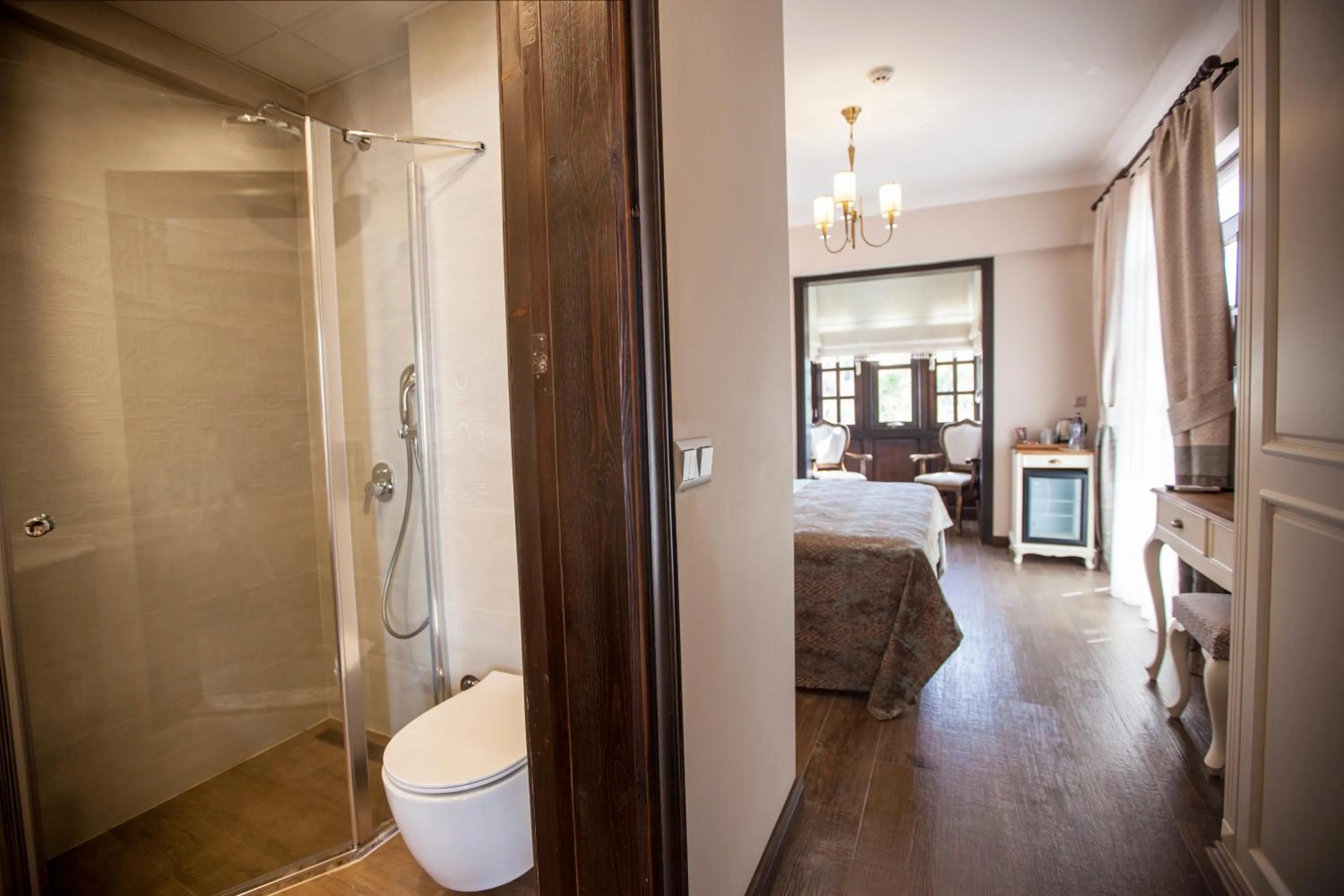 Toilet, Bed in Livia Garden Hotel