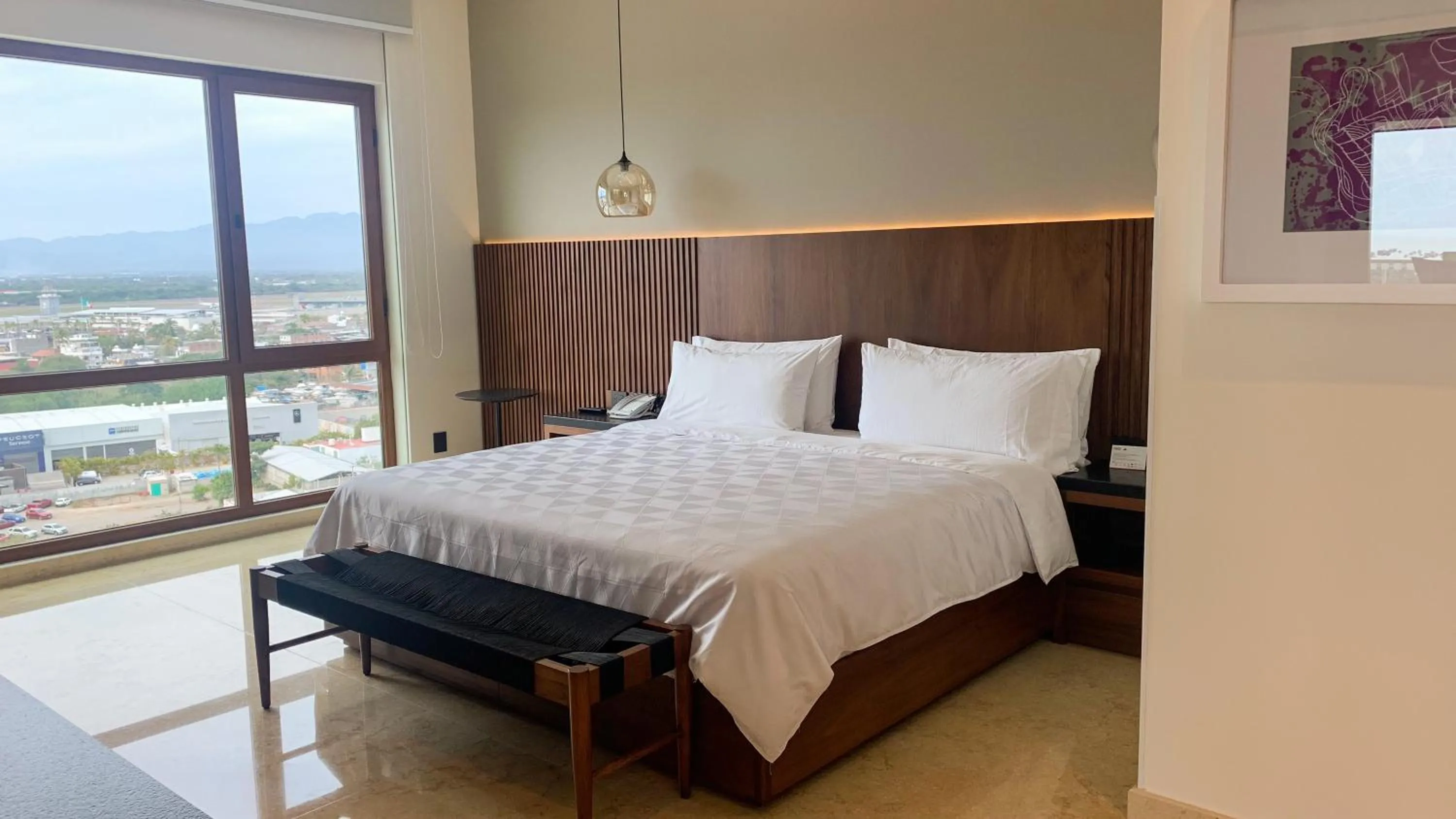 Photo of the whole room, Bed in Holiday Inn & Suites - Puerto Vallarta Marina & Golf by IHG