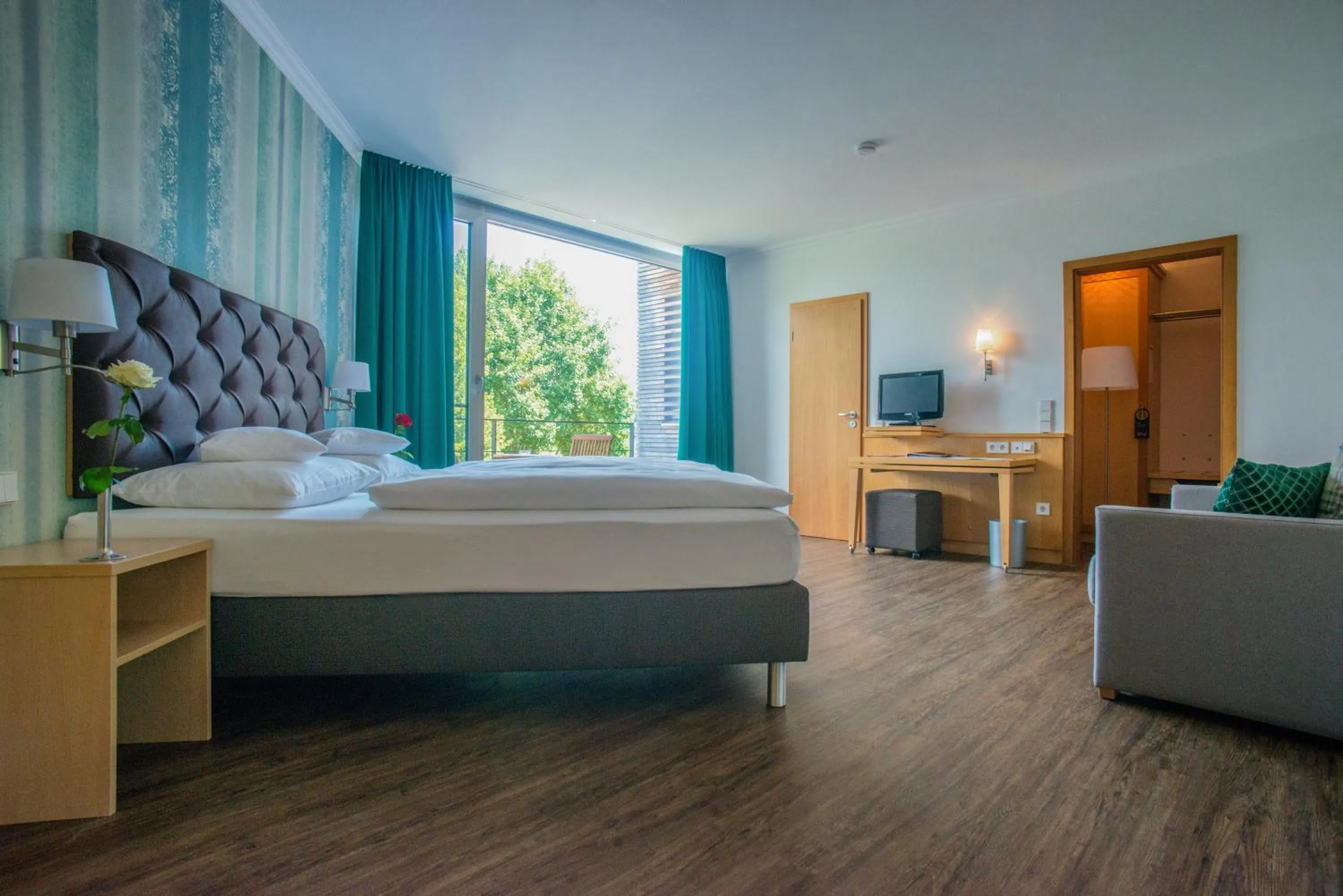 Photo of the whole room, Bed in Waldsee Golf-Resort