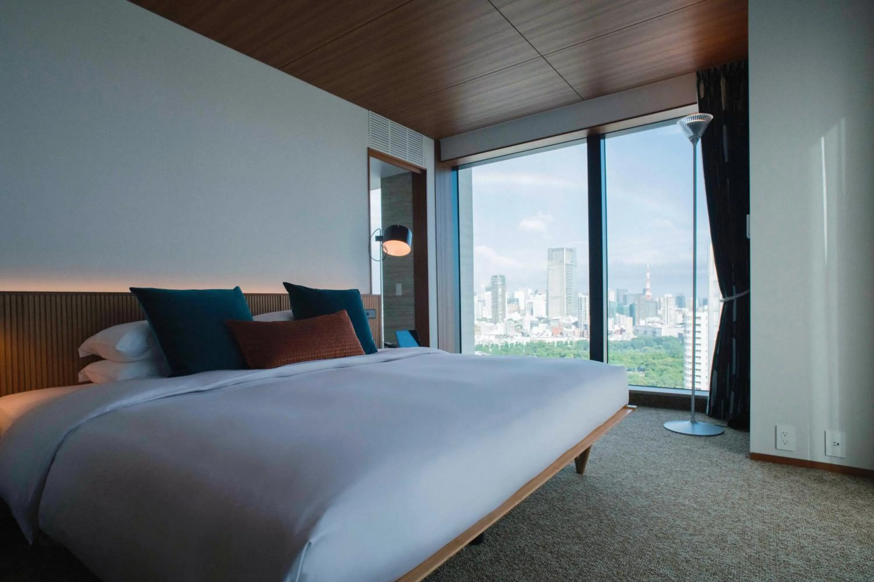 Bed in THE AOYAMA GRAND HOTEL