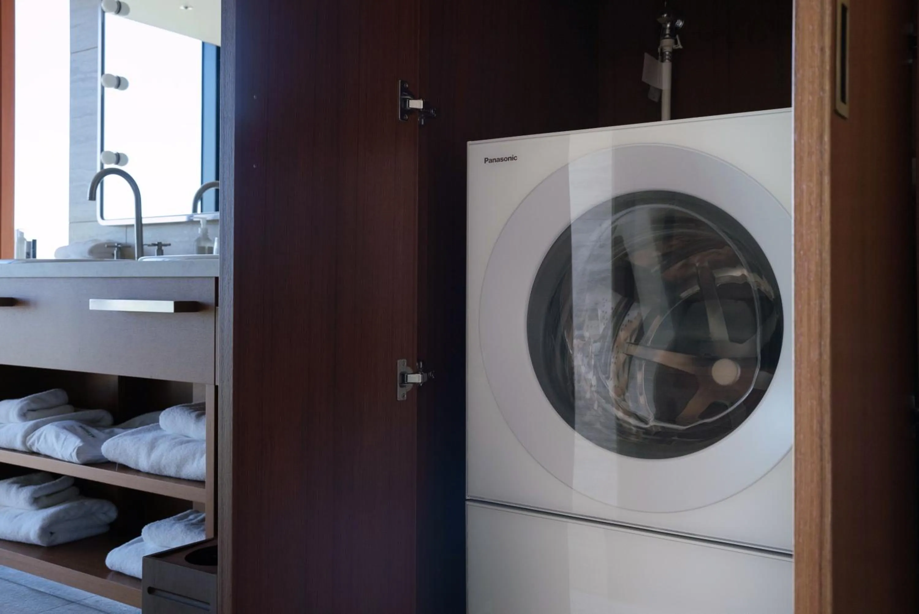 washing machine in THE AOYAMA GRAND HOTEL