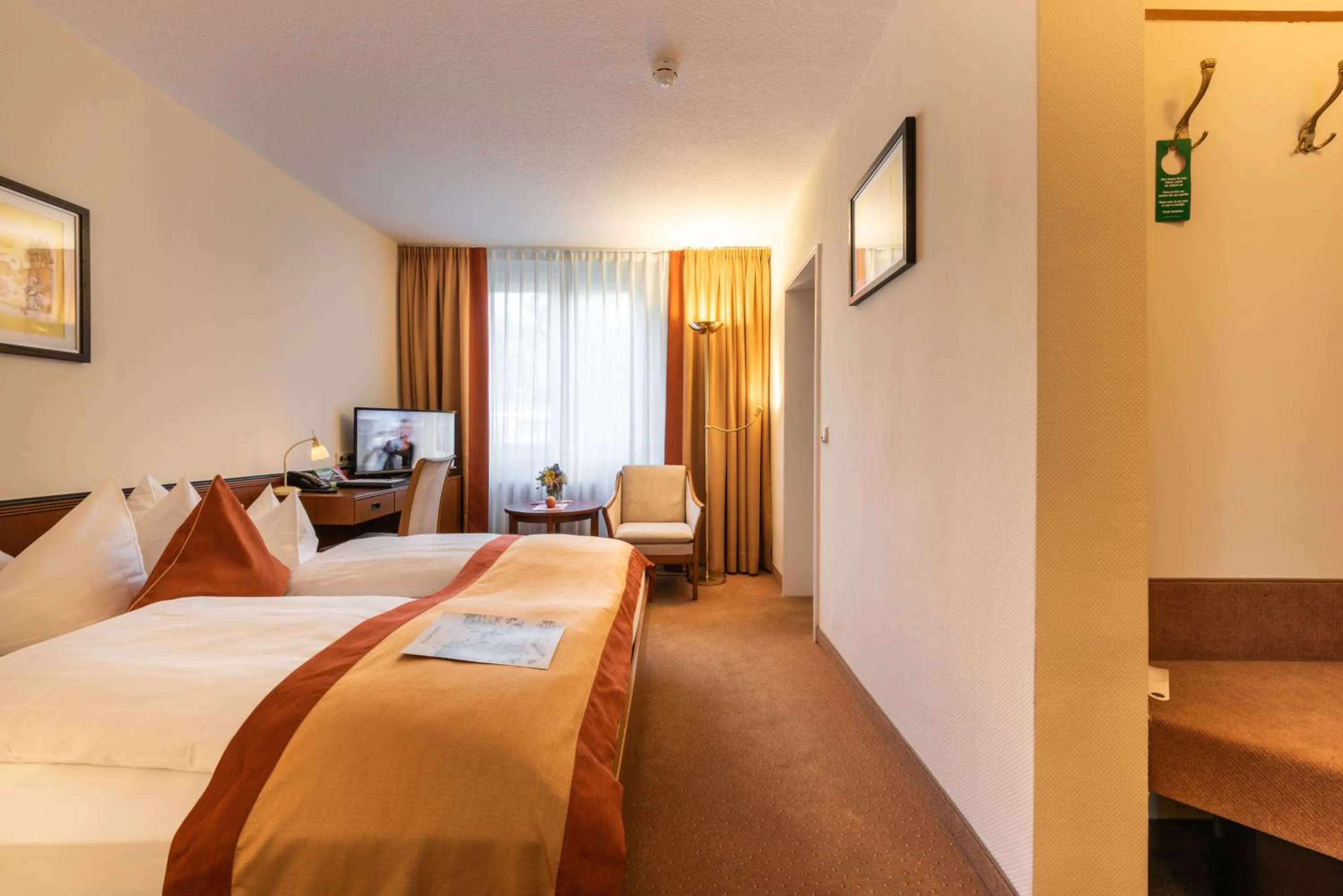 Photo of the whole room, Bed in Parkhotel Stadtallendorf
