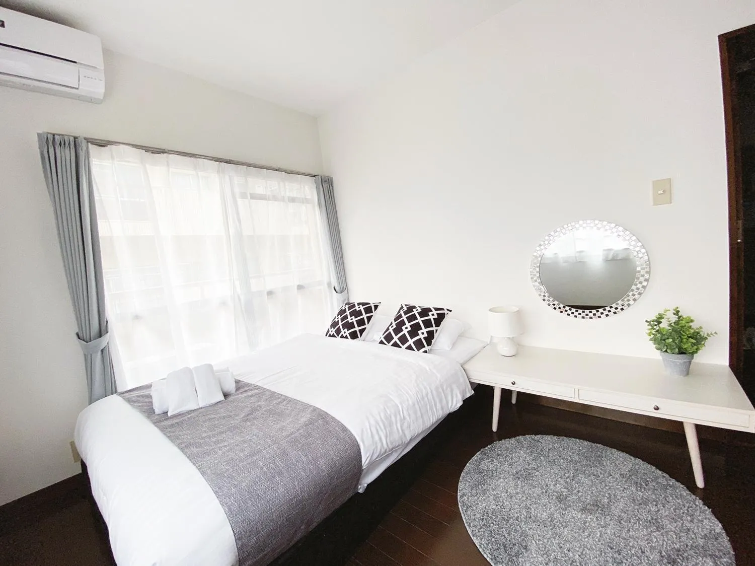 Bed in OUCHI HOTEL Itsukaichi