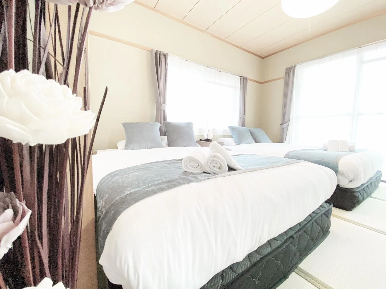 Bed in OUCHI HOTEL Itsukaichi