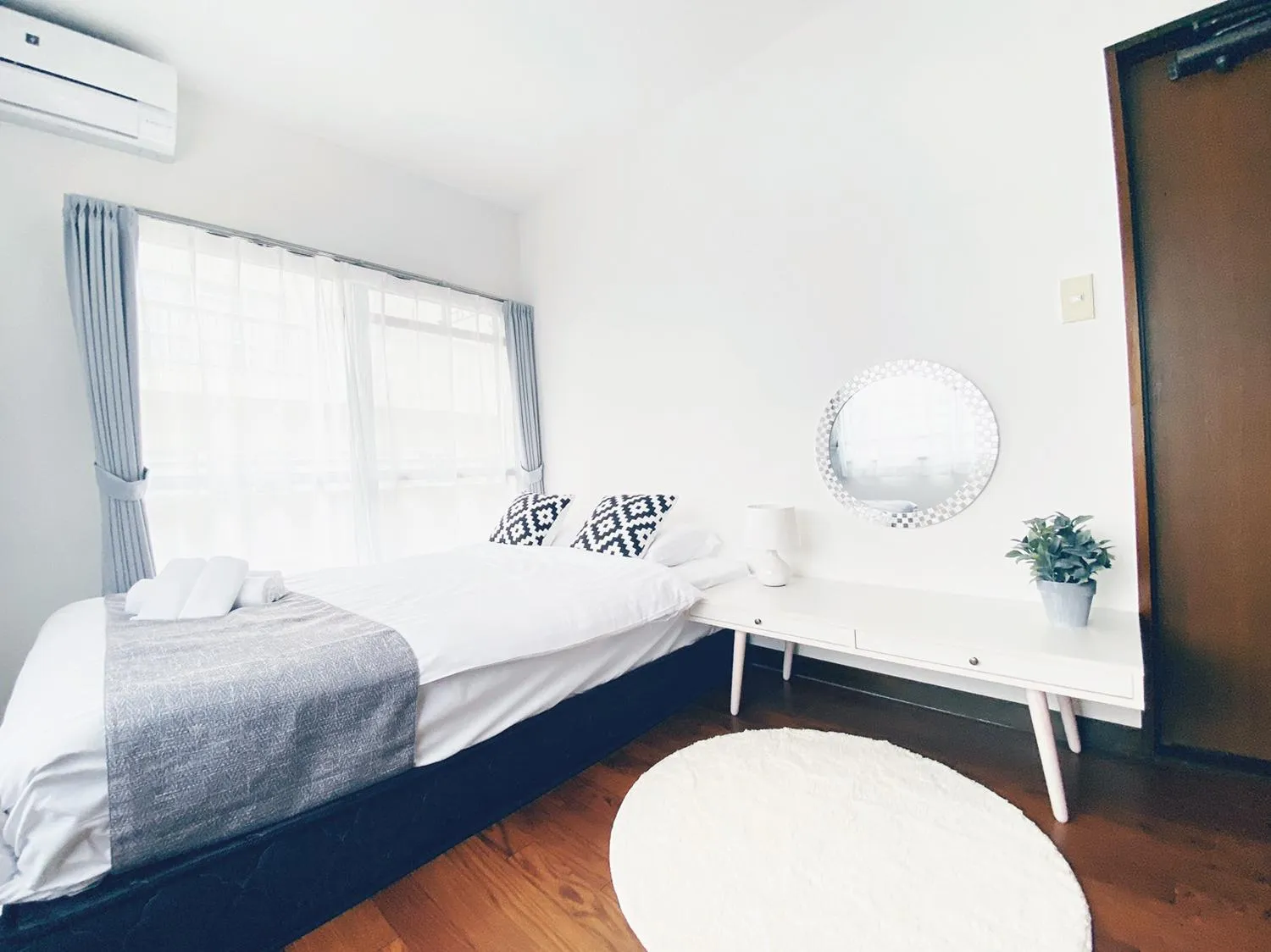 Bed in OUCHI HOTEL Itsukaichi