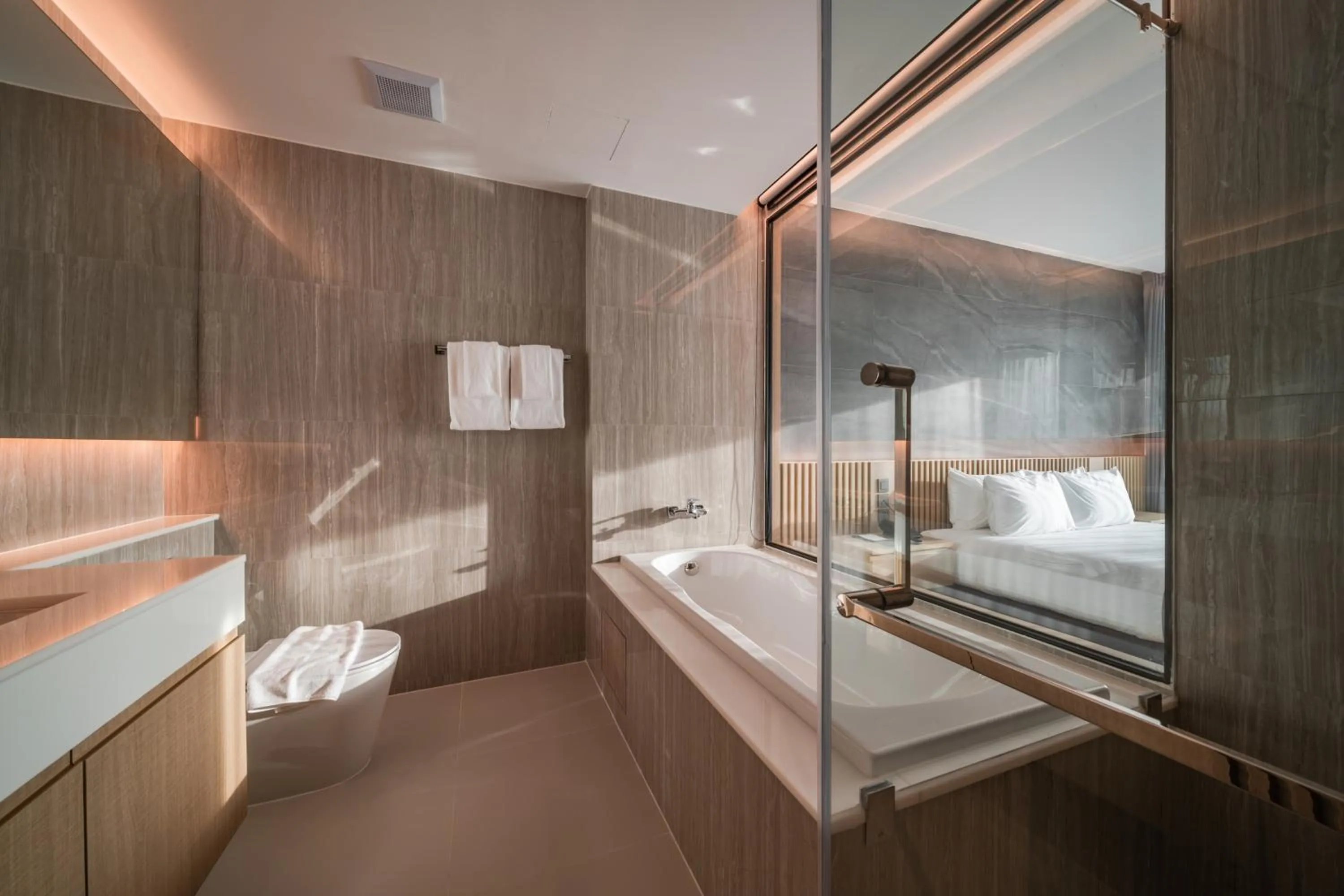 Bathroom, Bed in Mandarin Eastville, Pattaya - SHA Extra Plus