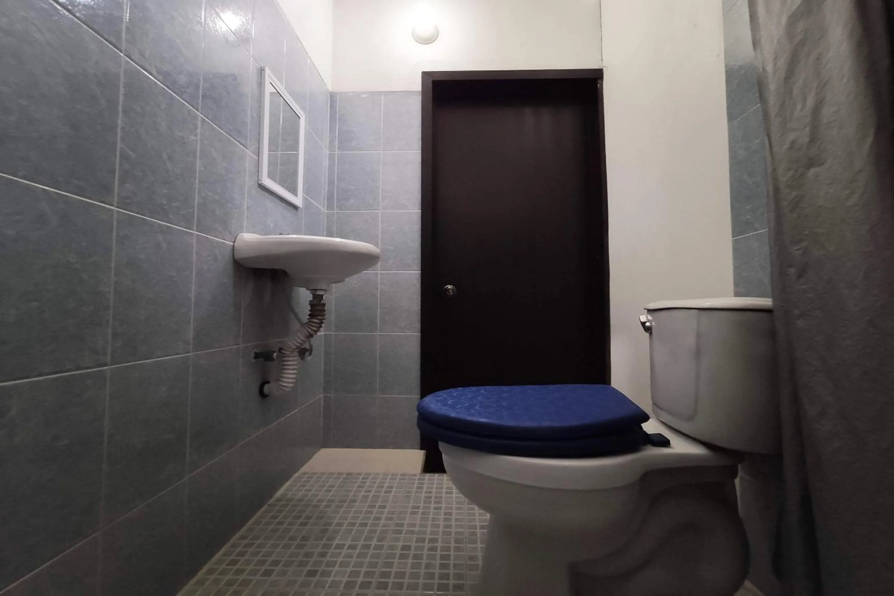 Bathroom in OYO Hotel Trigos De Oro,San Luis Teolocholco Park