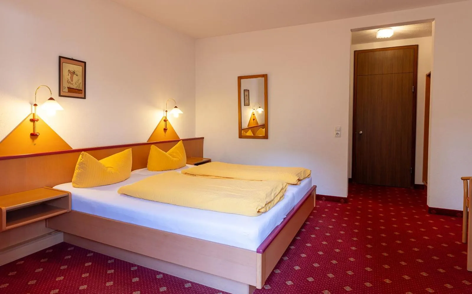 Bed in Hotel Alpenhof