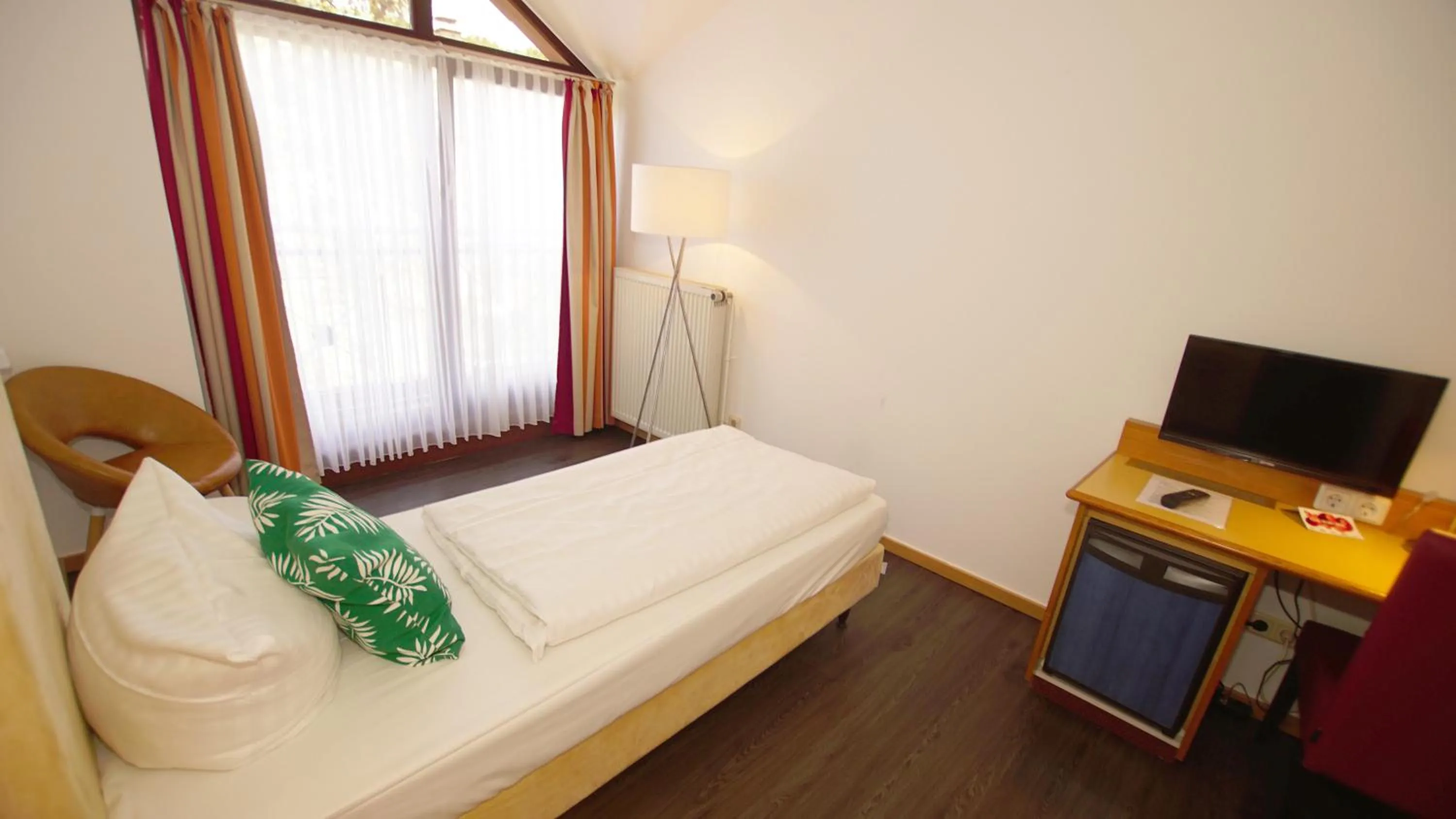 Photo of the whole room, Bed in Hotel Tannenhof Haiger