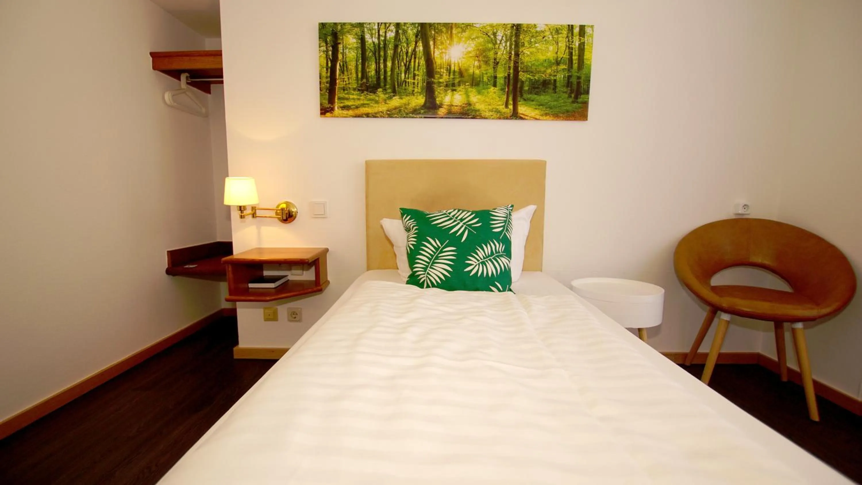 Photo of the whole room, Bed in Hotel Tannenhof Haiger