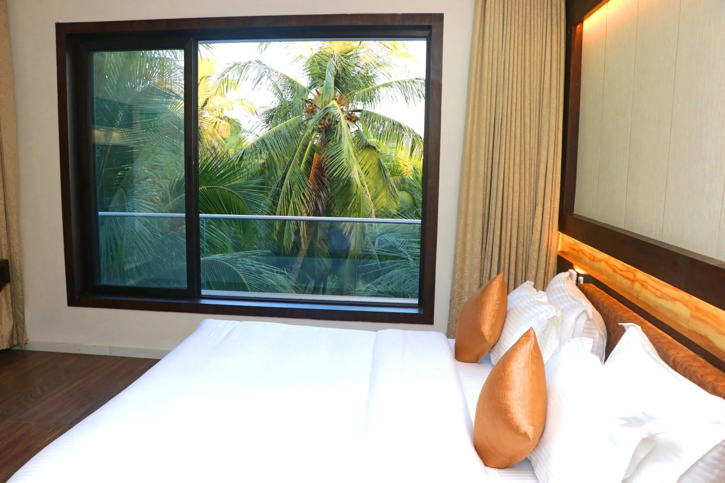View (from property/room), Bed in THE GRAND ASTORIA SOMANTH by Shivalaya Darshanam