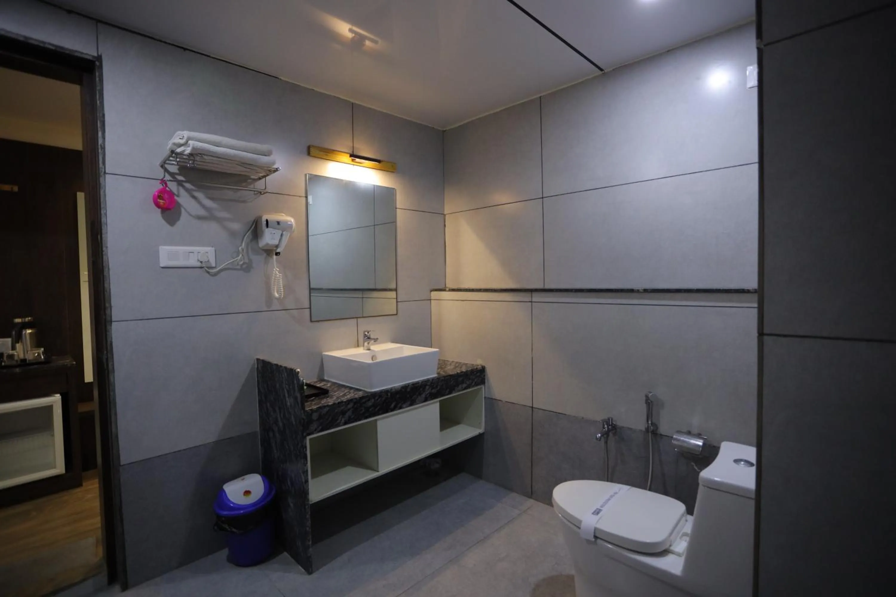 Bathroom in THE GRAND ASTORIA SOMANTH by Shivalaya Darshanam