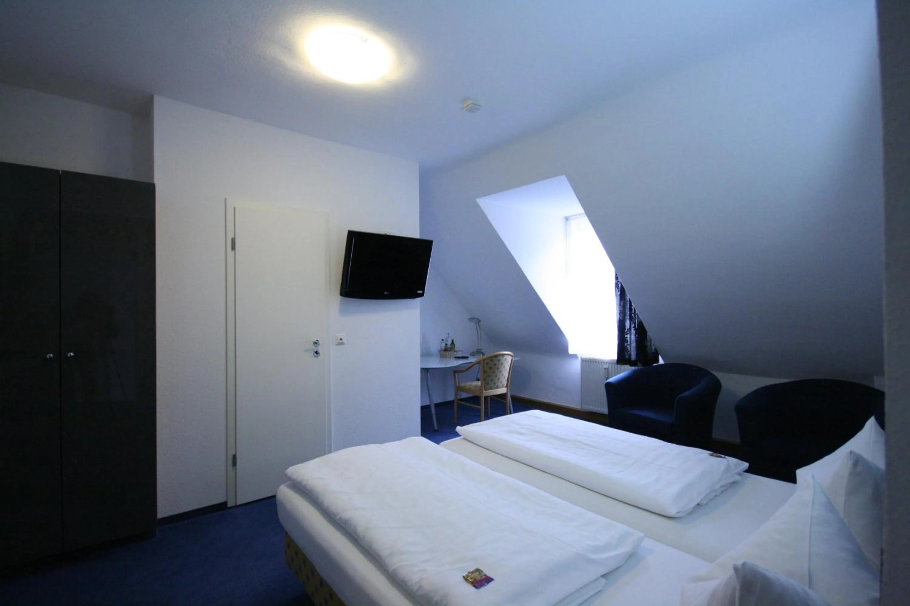 Photo of the whole room, Bed in Altstadt Hotel