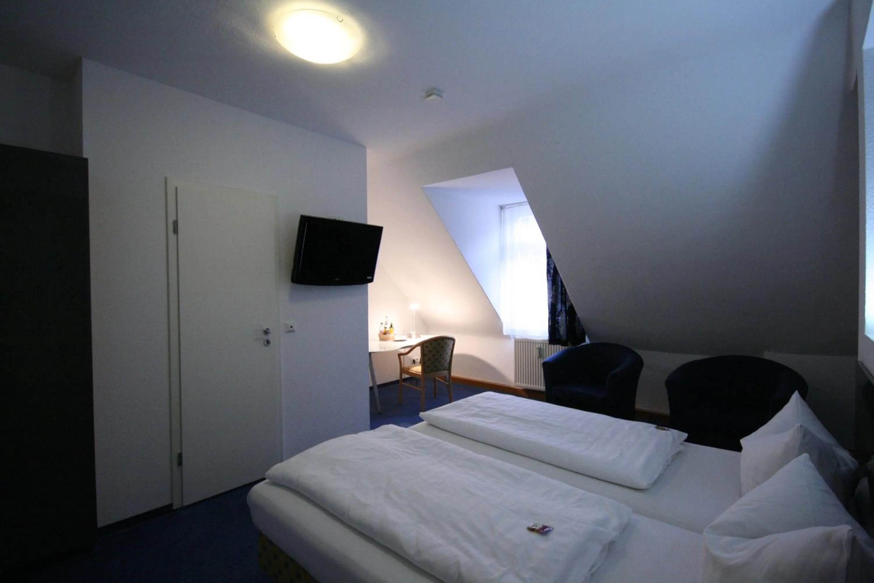 Photo of the whole room, Bed in Altstadt Hotel