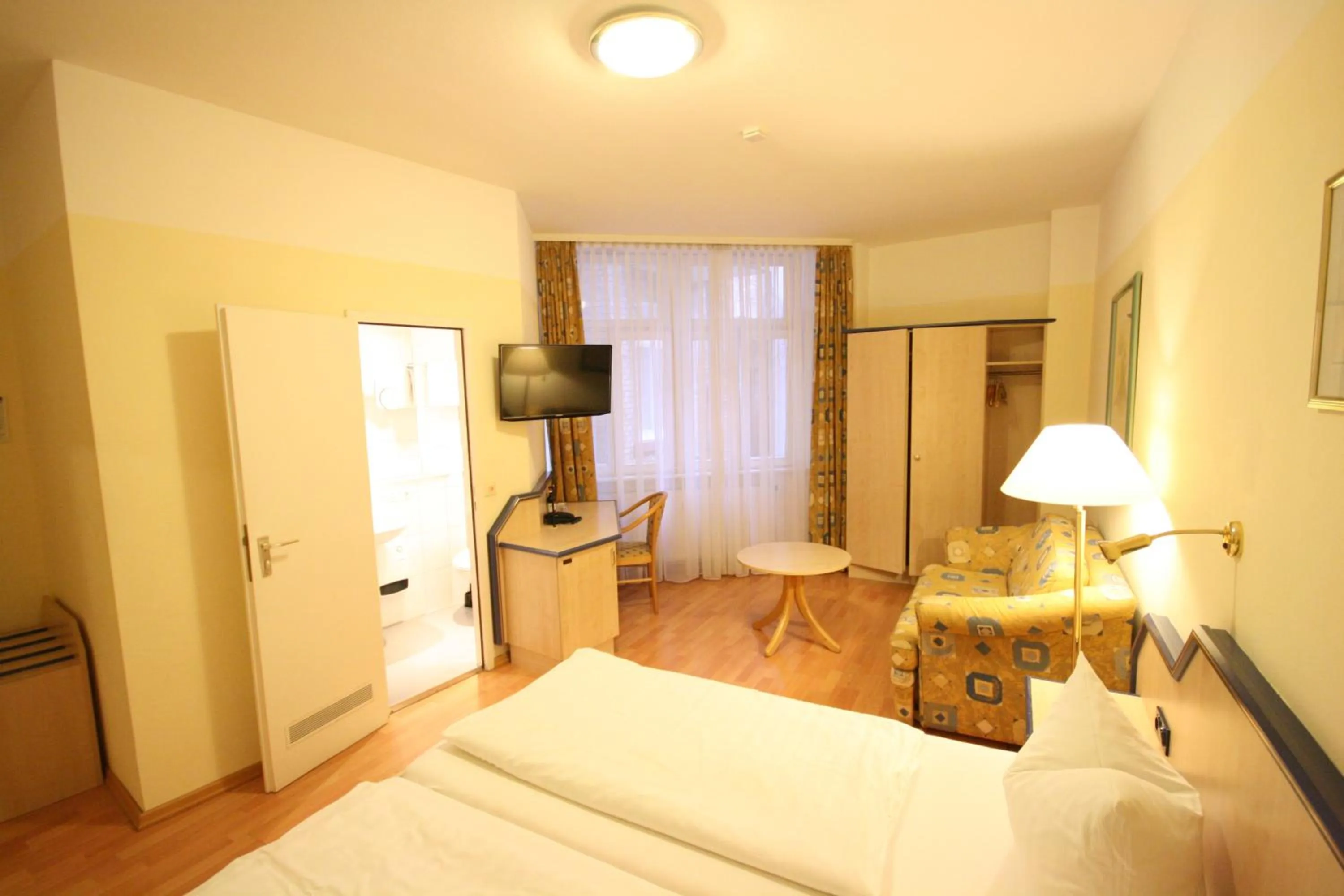 Photo of the whole room, Bed in Altstadt Hotel