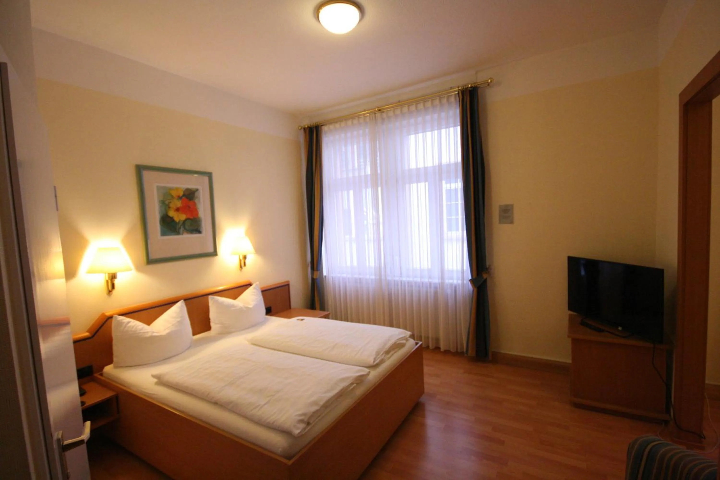 Photo of the whole room, Bed in Altstadt Hotel