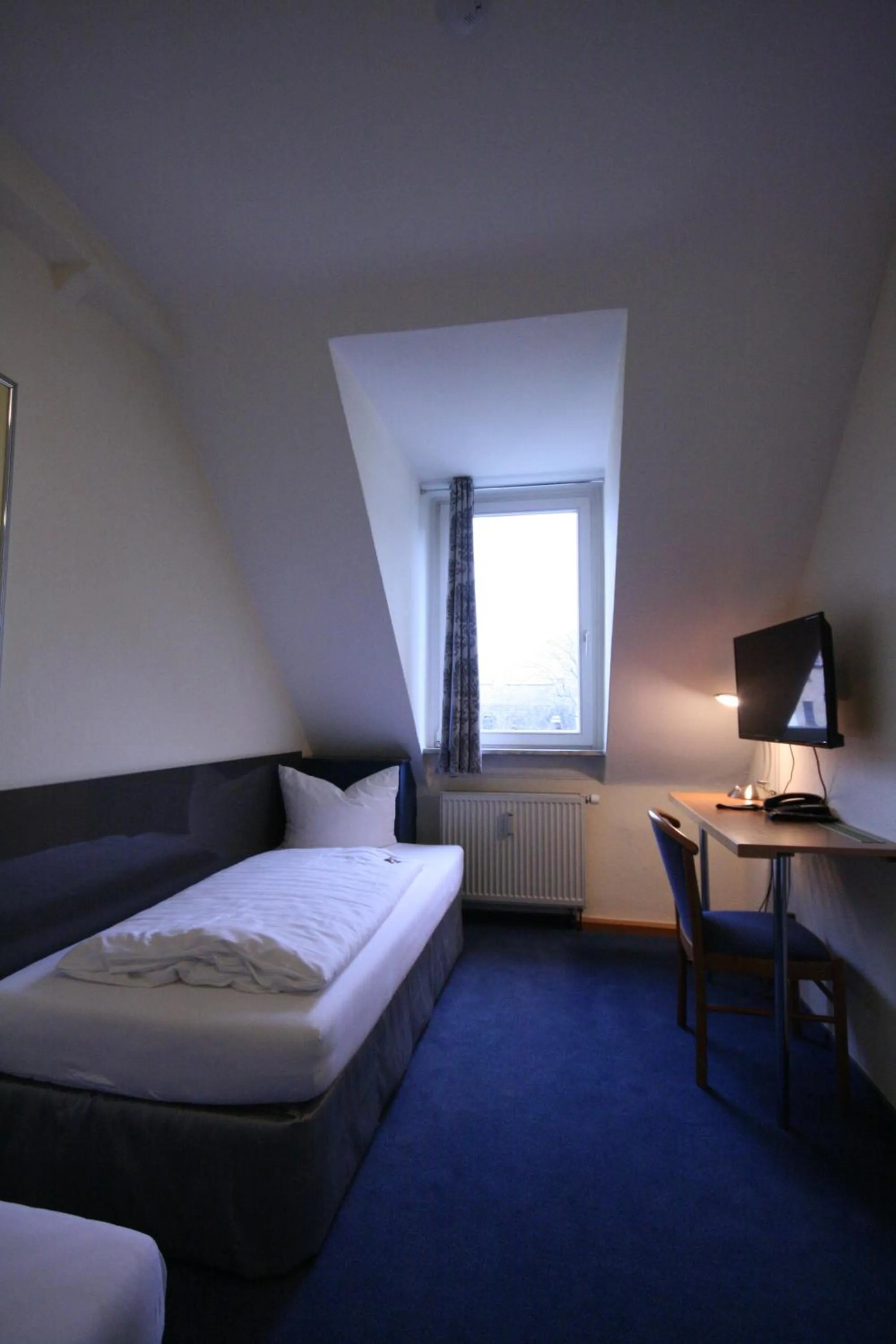 Photo of the whole room, Bed in Altstadt Hotel