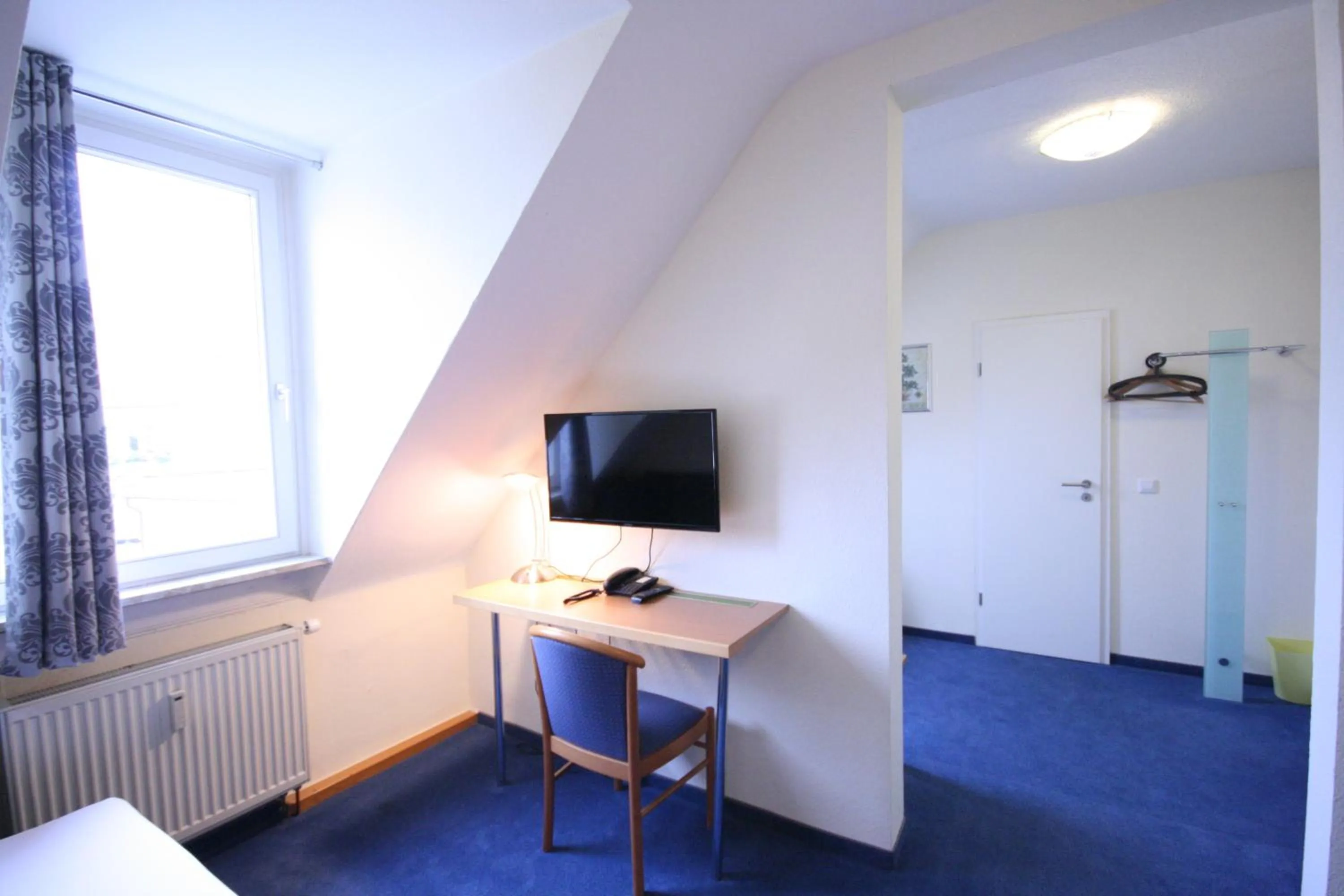 Photo of the whole room, Bed in Altstadt Hotel