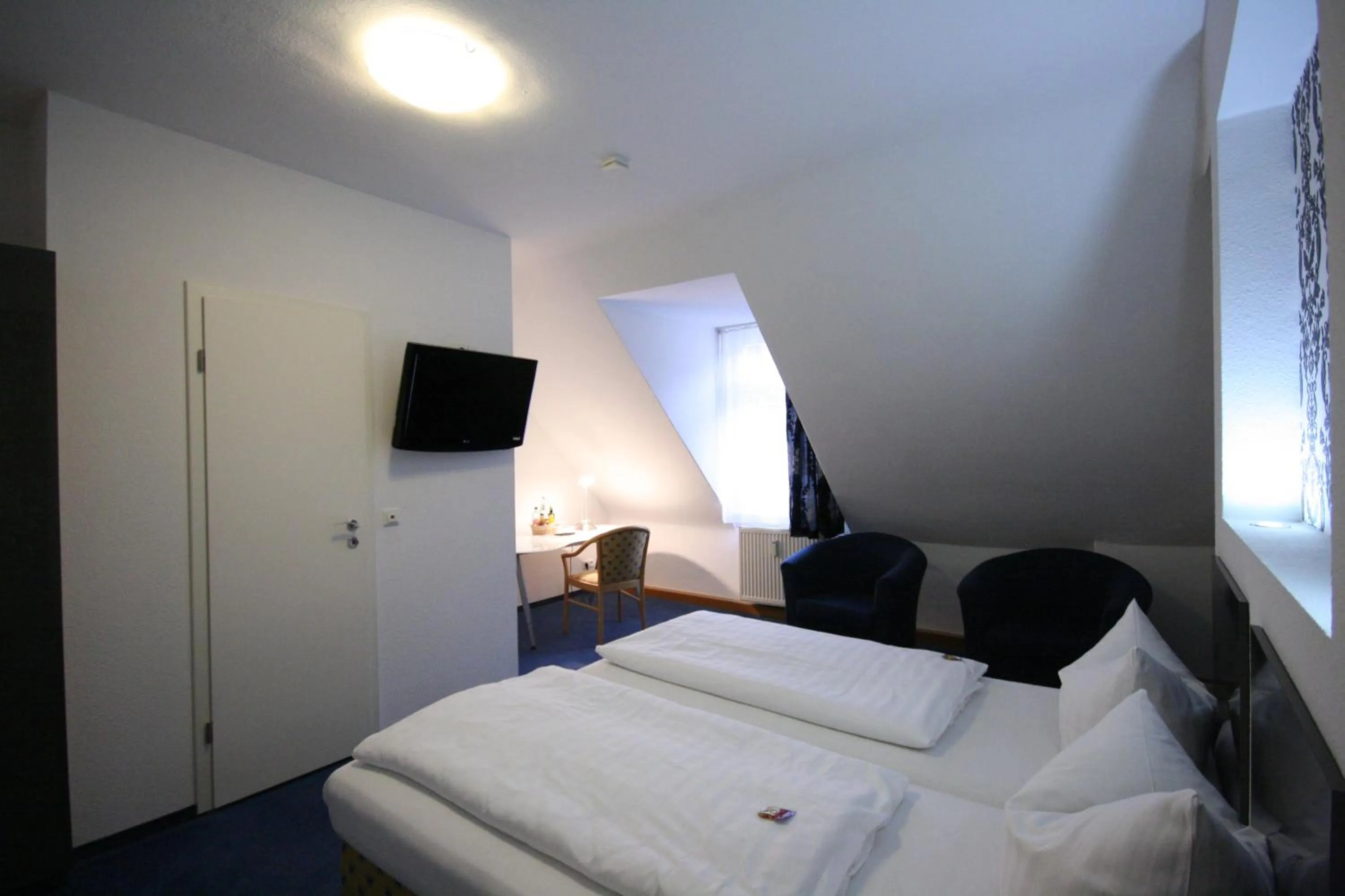 Photo of the whole room, Bed in Altstadt Hotel