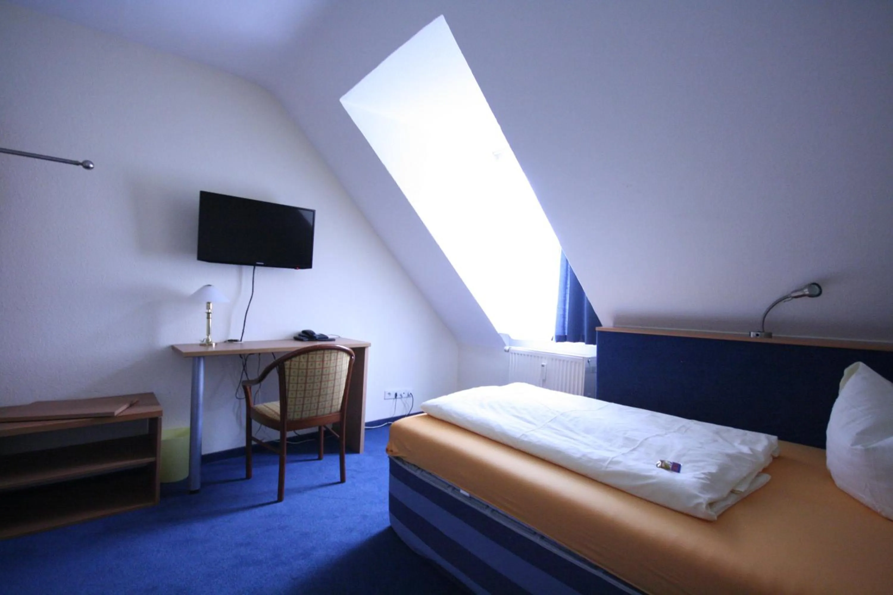 Photo of the whole room, Bed in Altstadt Hotel