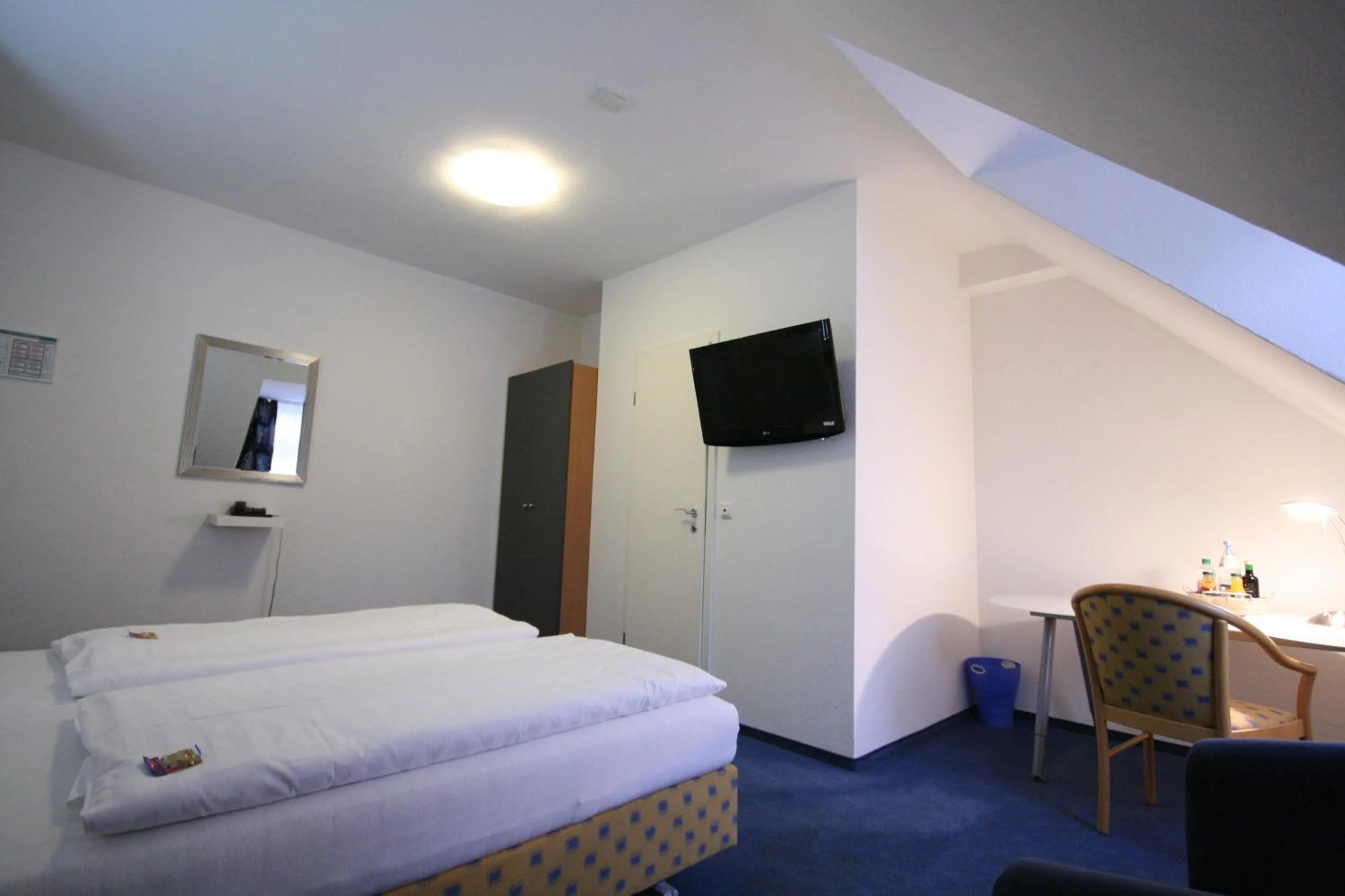 Photo of the whole room, Bed in Altstadt Hotel