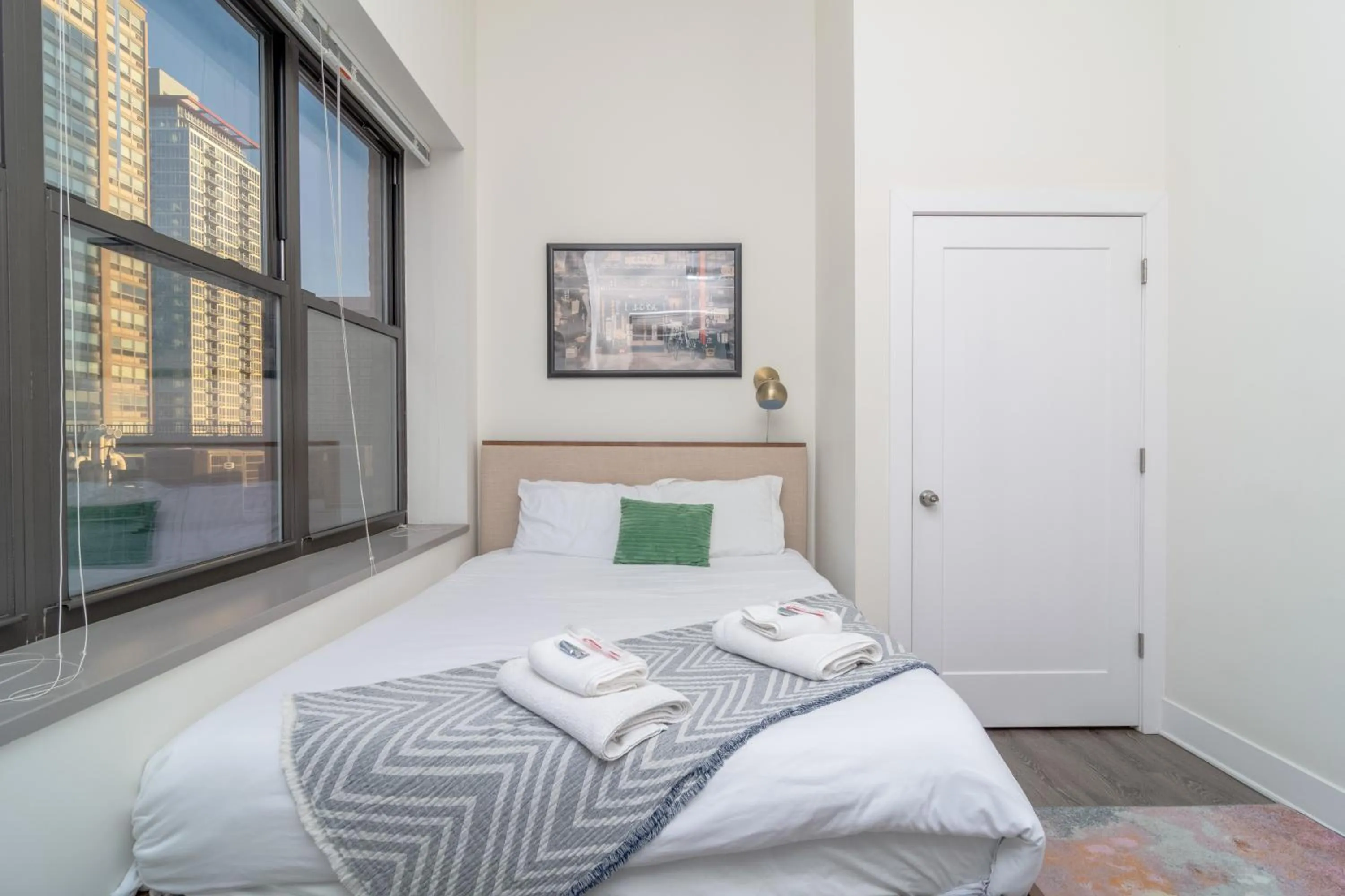 Bed in McCormick Place 3BR Luxury Penthouse Duplex with Personal Rooftop and Optional Parking for 8 guests in Chicago South Loop