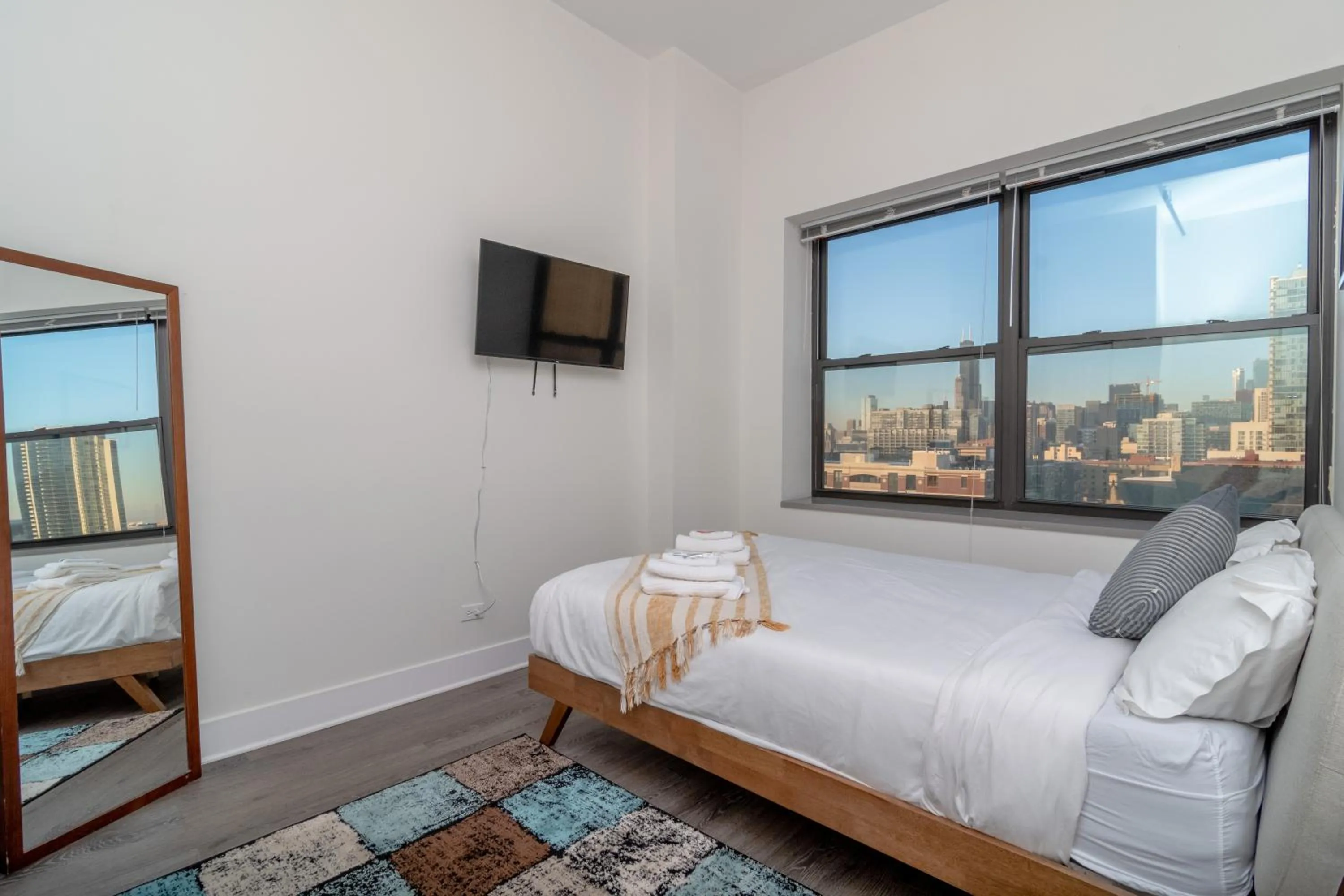 Bed in McCormick Place 3BR Luxury Penthouse Duplex with Personal Rooftop and Optional Parking for 8 guests in Chicago South Loop