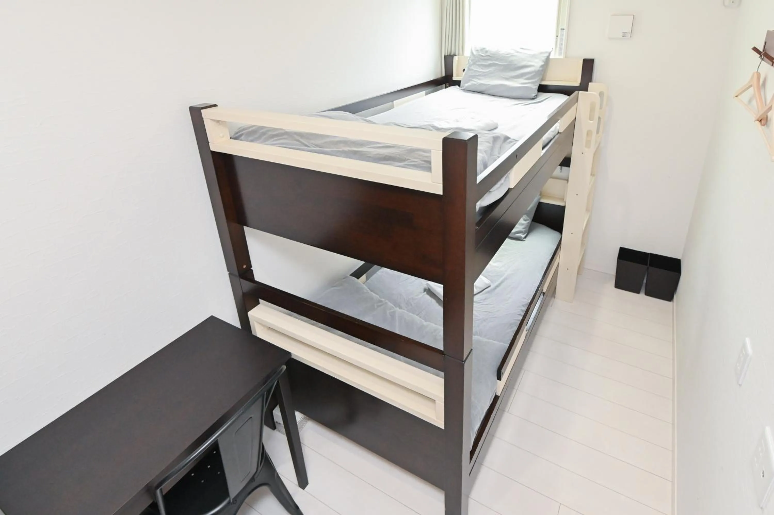 Bed in RUMa INN Rokugoudote