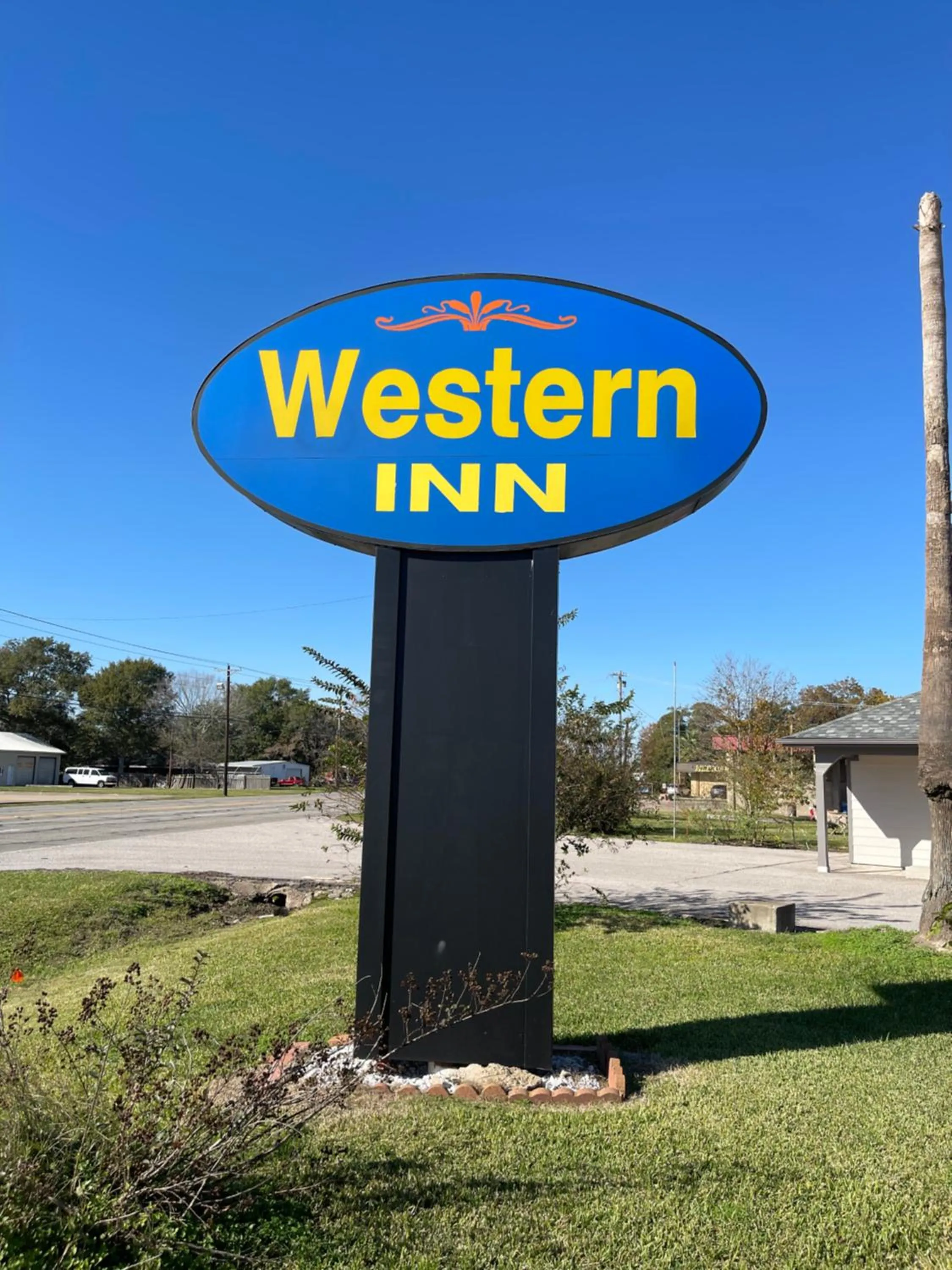 Property logo or sign in Western Inn