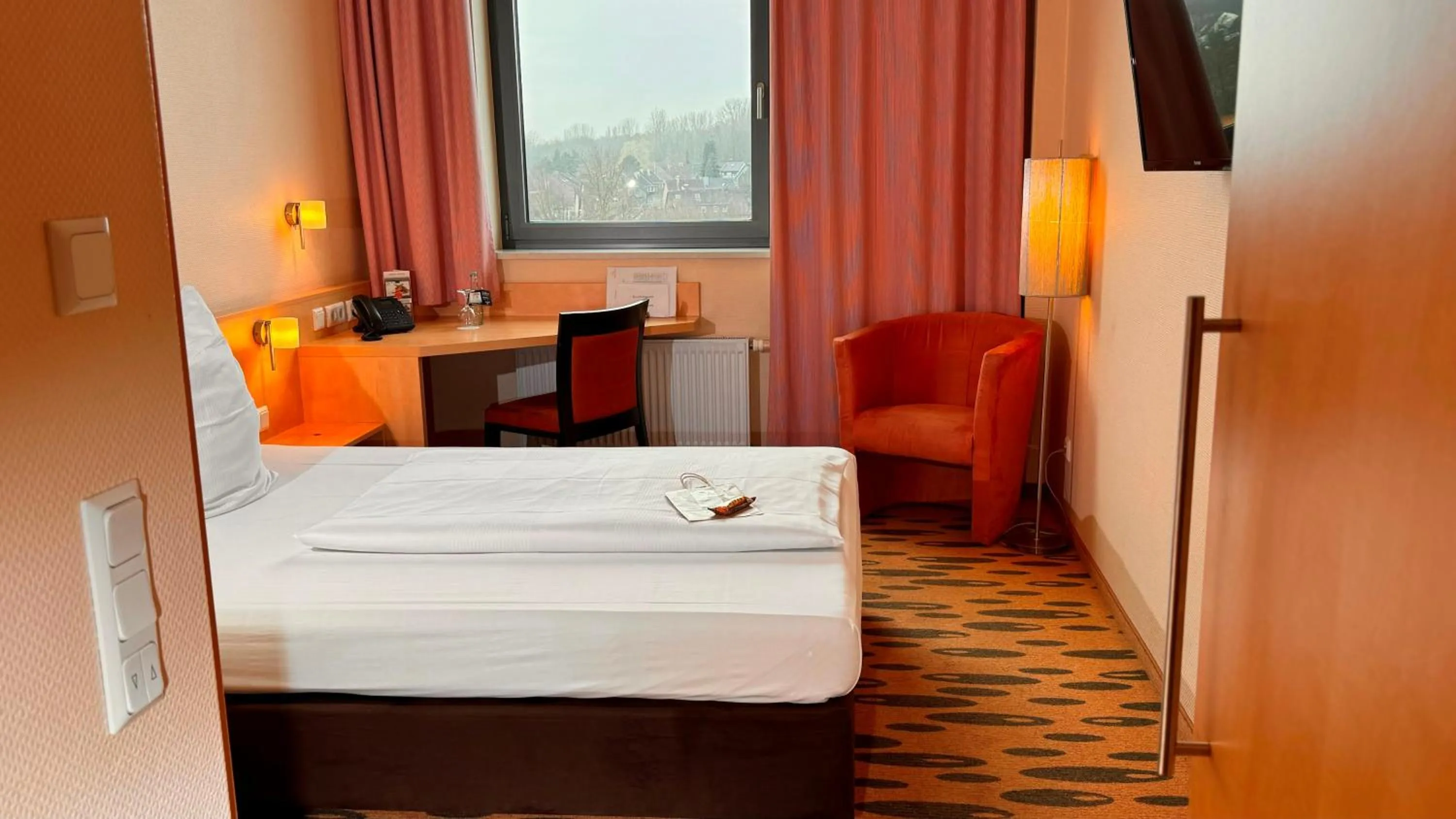Photo of the whole room, Bed in Hotel Rhein-Ruhr Bottrop